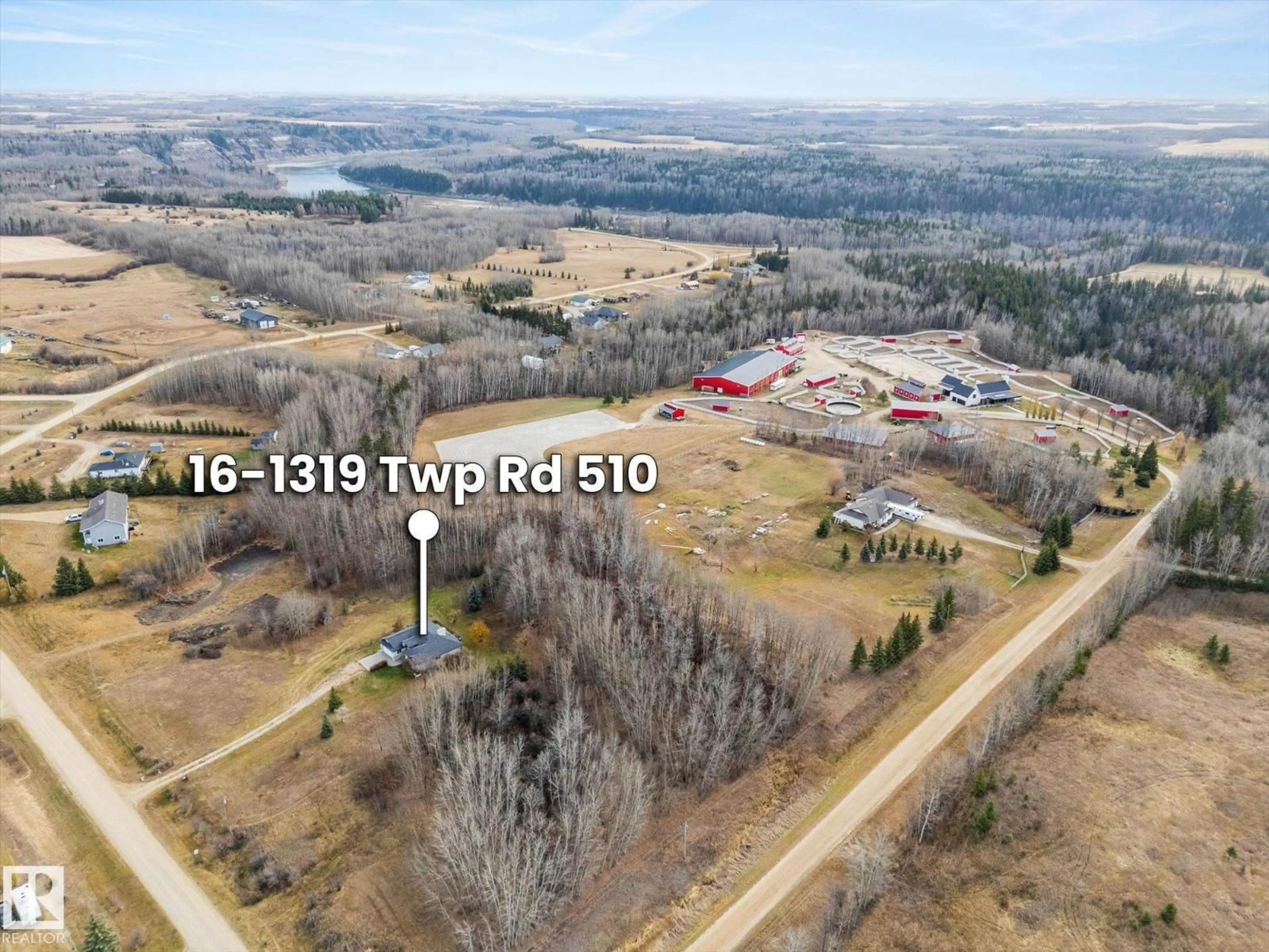 A pic from outside/outdoor area/front of a property/back of a property/a pic from drone, unknown for #16 - 1319 TWP ROAD 510, Rural Parkland County Alberta T7Y2N2