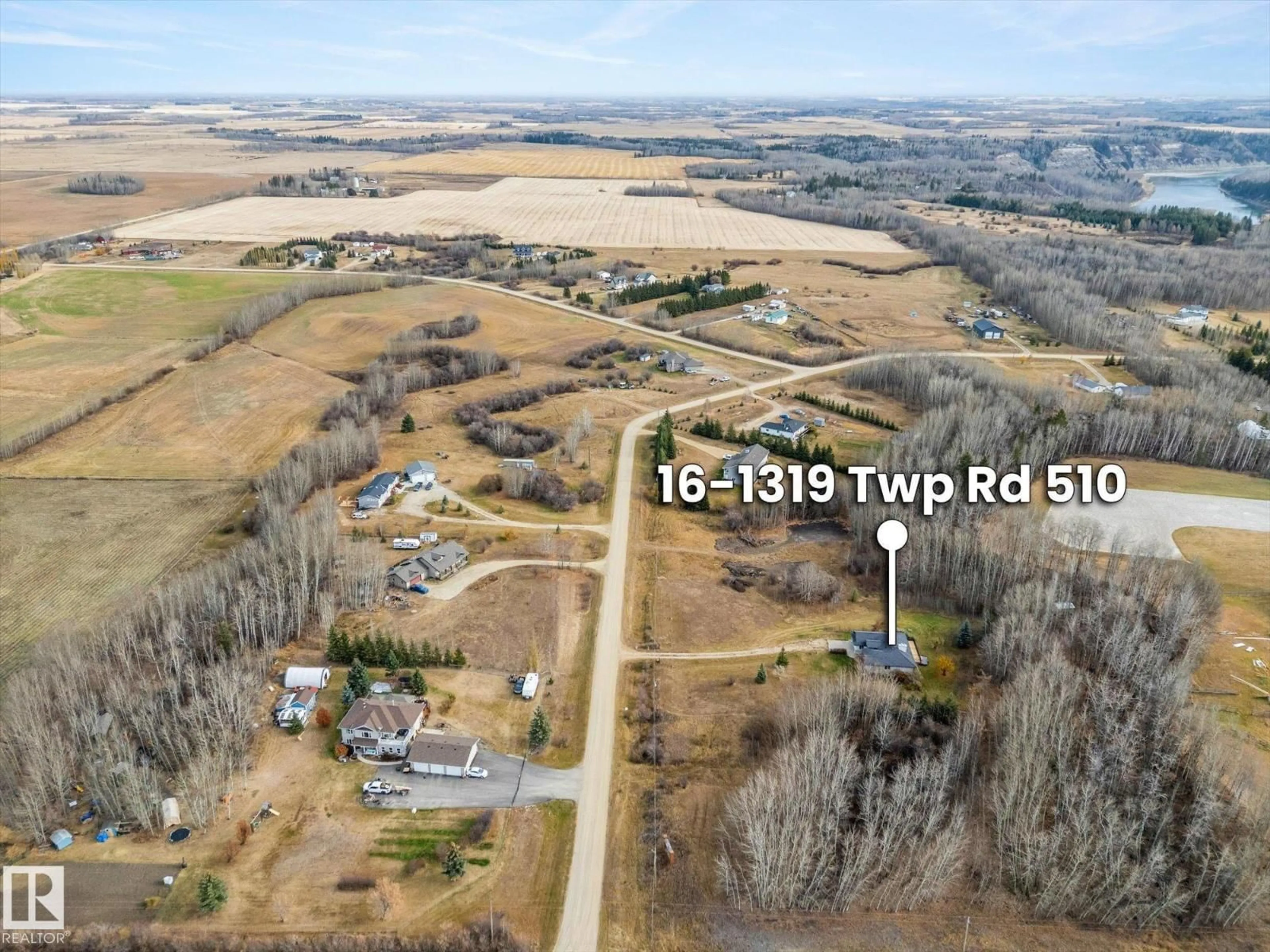 A pic from outside/outdoor area/front of a property/back of a property/a pic from drone, unknown for #16 - 1319 TWP ROAD 510, Rural Parkland County Alberta T7Y2N2