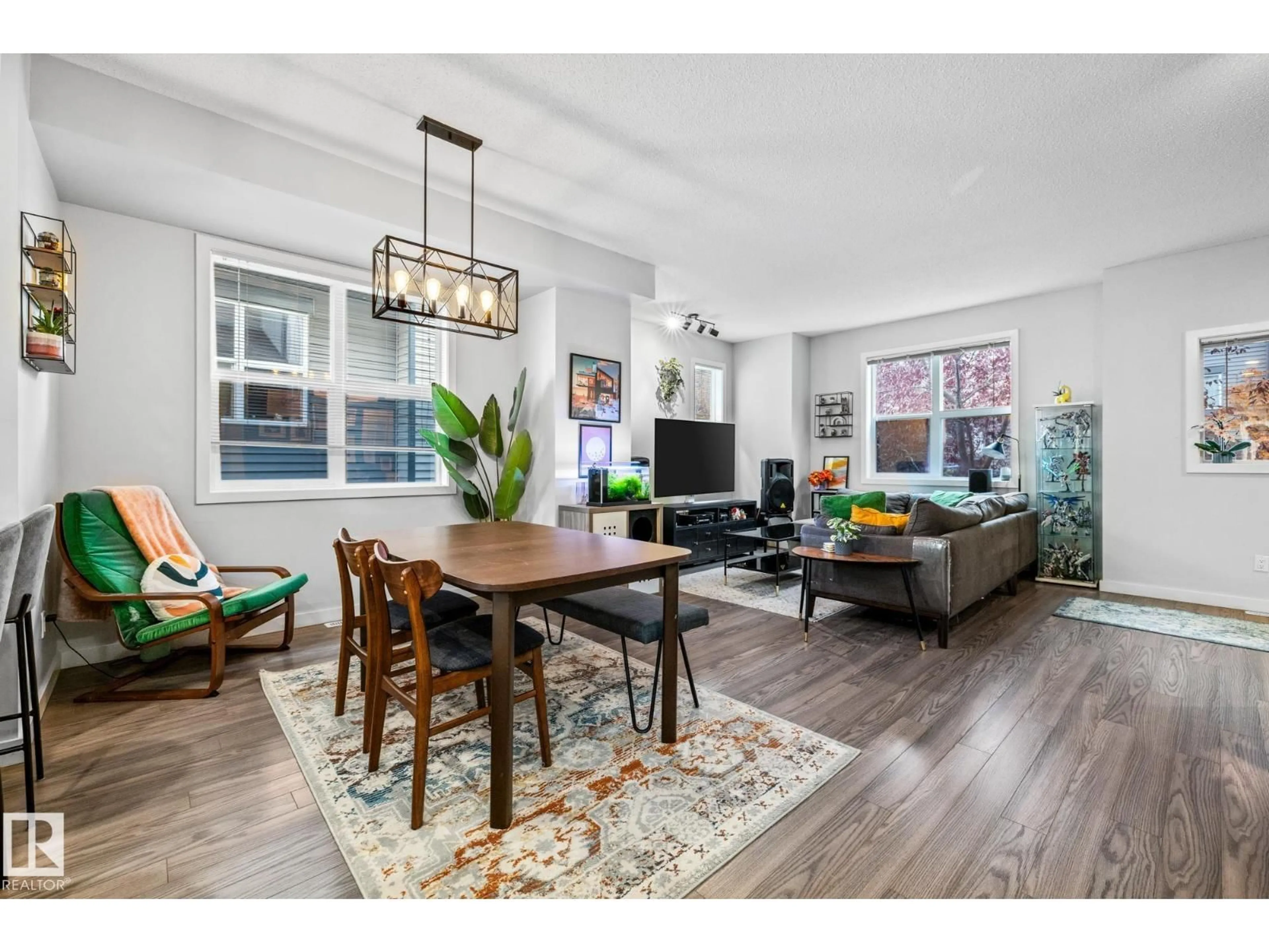 Living room with furniture, wood/laminate floor for 45 - 655 WATT BV, Edmonton Alberta T6X0Y2