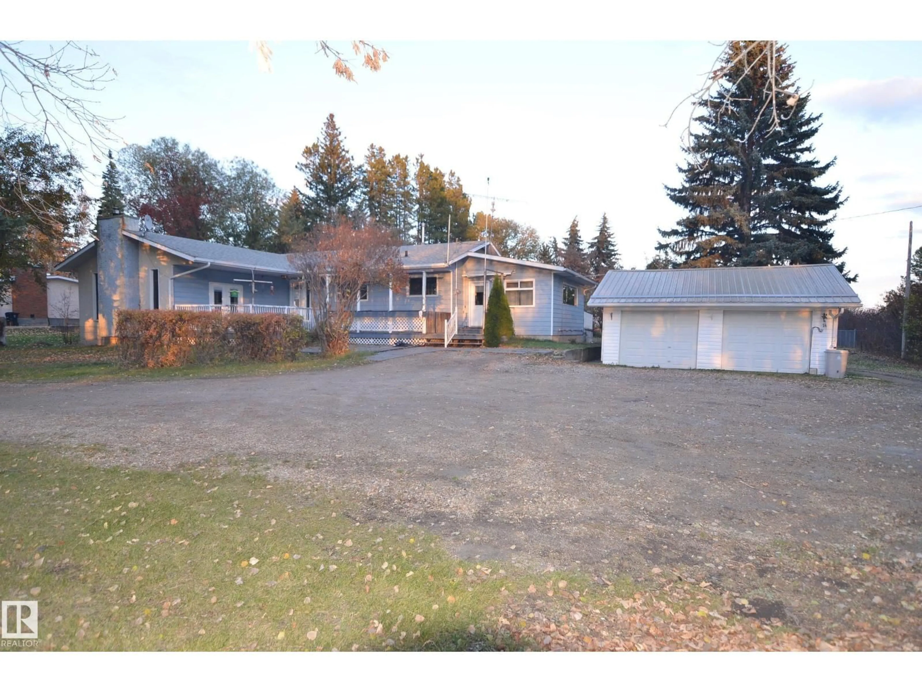 A pic from outside/outdoor area/front of a property/back of a property/a pic from drone, street for 5815 BOUNDARY ROAD, Barrhead Alberta T7N1B9