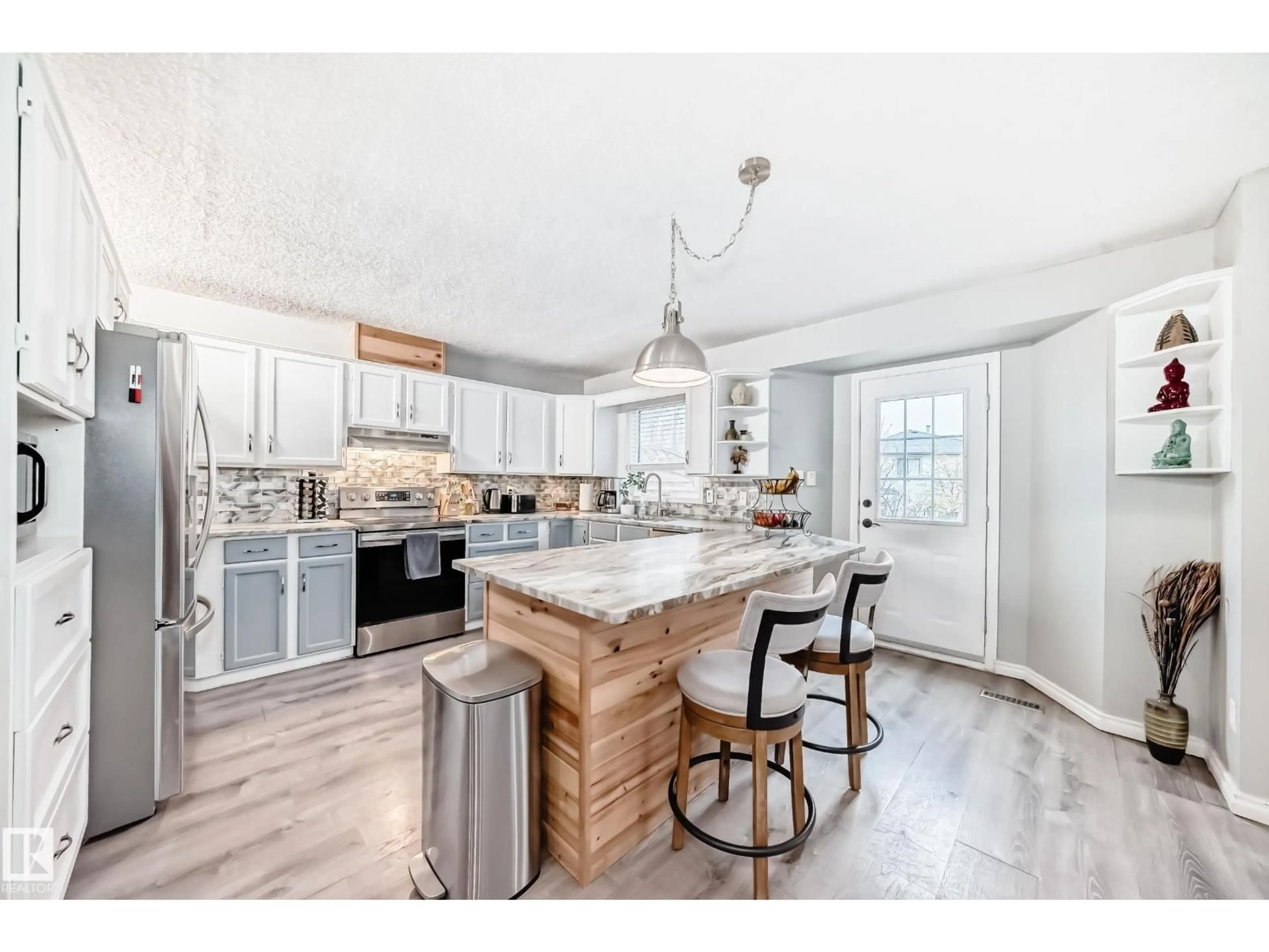 Open concept kitchen, unknown for 103 WOODSIDE CR, Spruce Grove Alberta T7X3V2