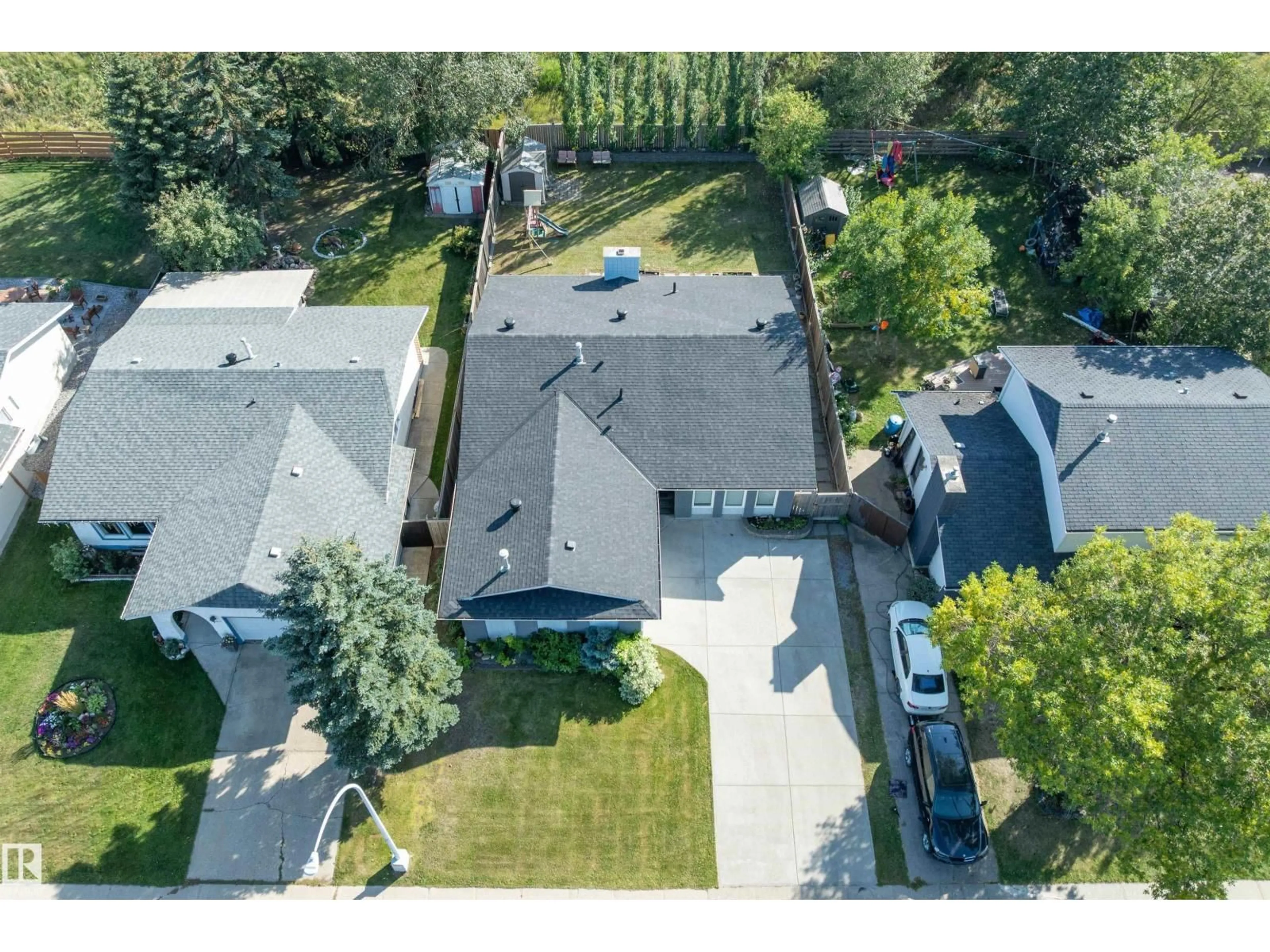A pic from outside/outdoor area/front of a property/back of a property/a pic from drone, street for 18211 80 AV, Edmonton Alberta T5T0V3