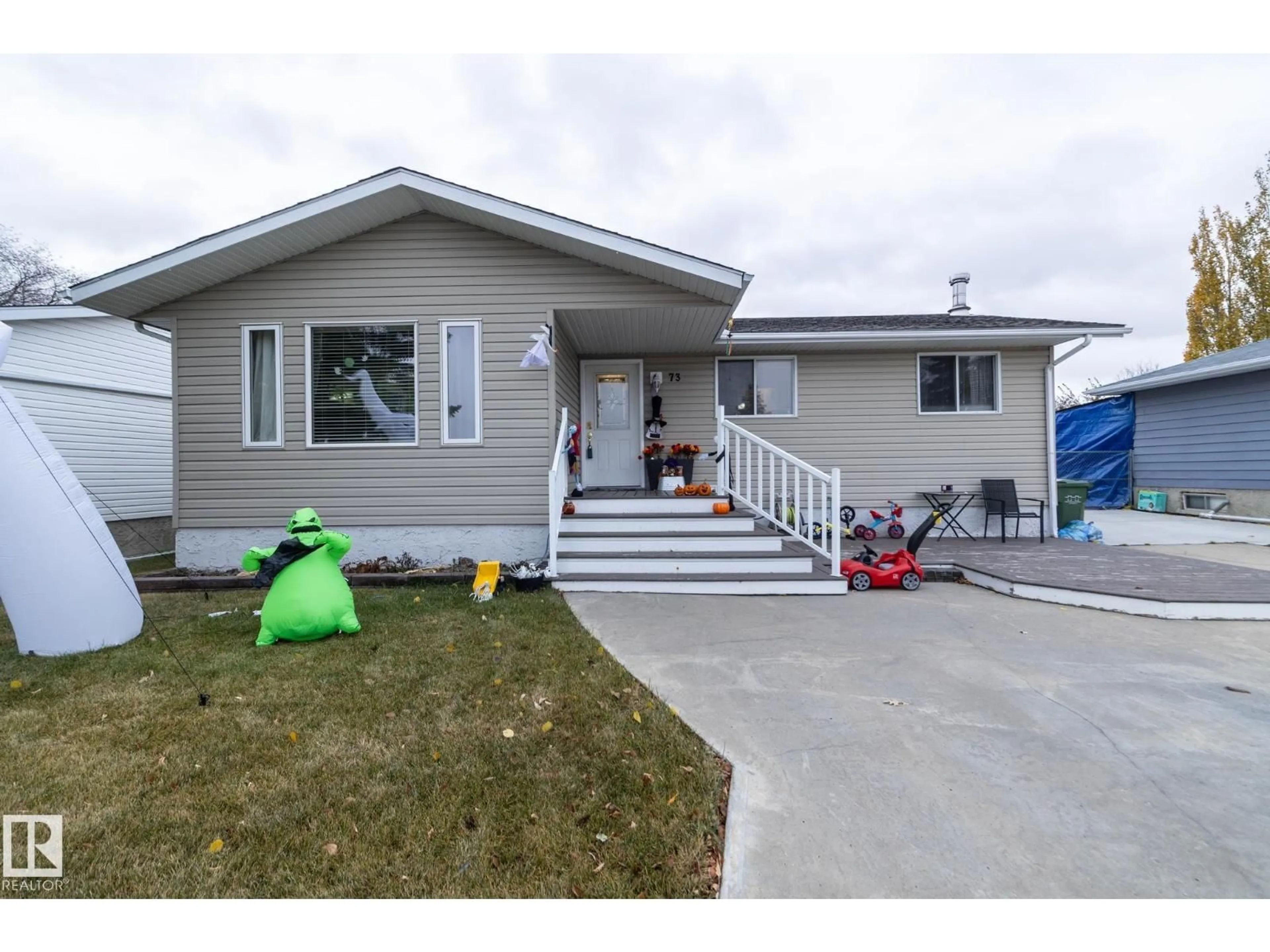Home with vinyl exterior material, street for 73 SOUTH PARK DR, Leduc Alberta T9E4X5