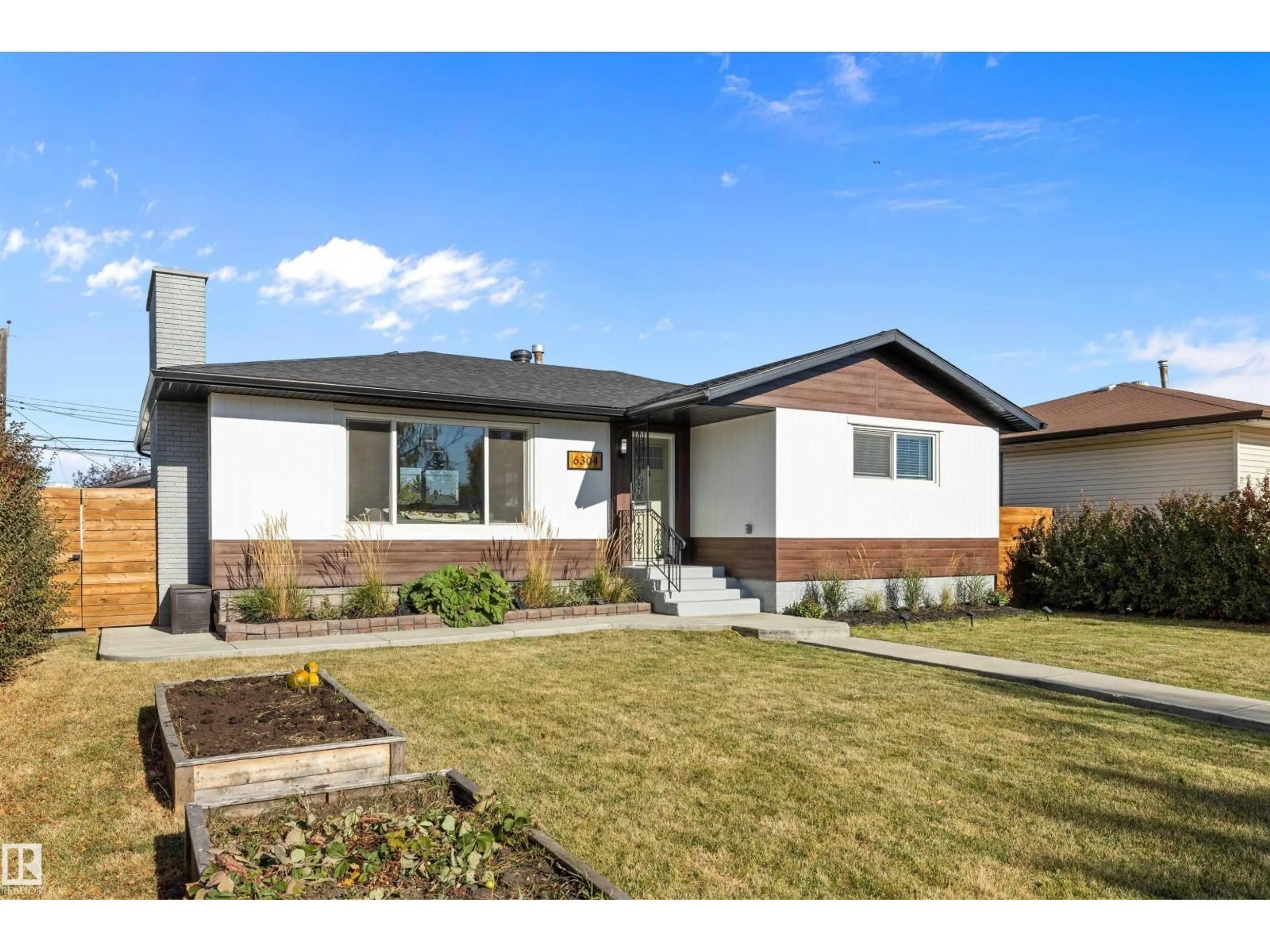 Home with vinyl exterior material, street for 6304 94A AV, Edmonton Alberta T6B0Y8