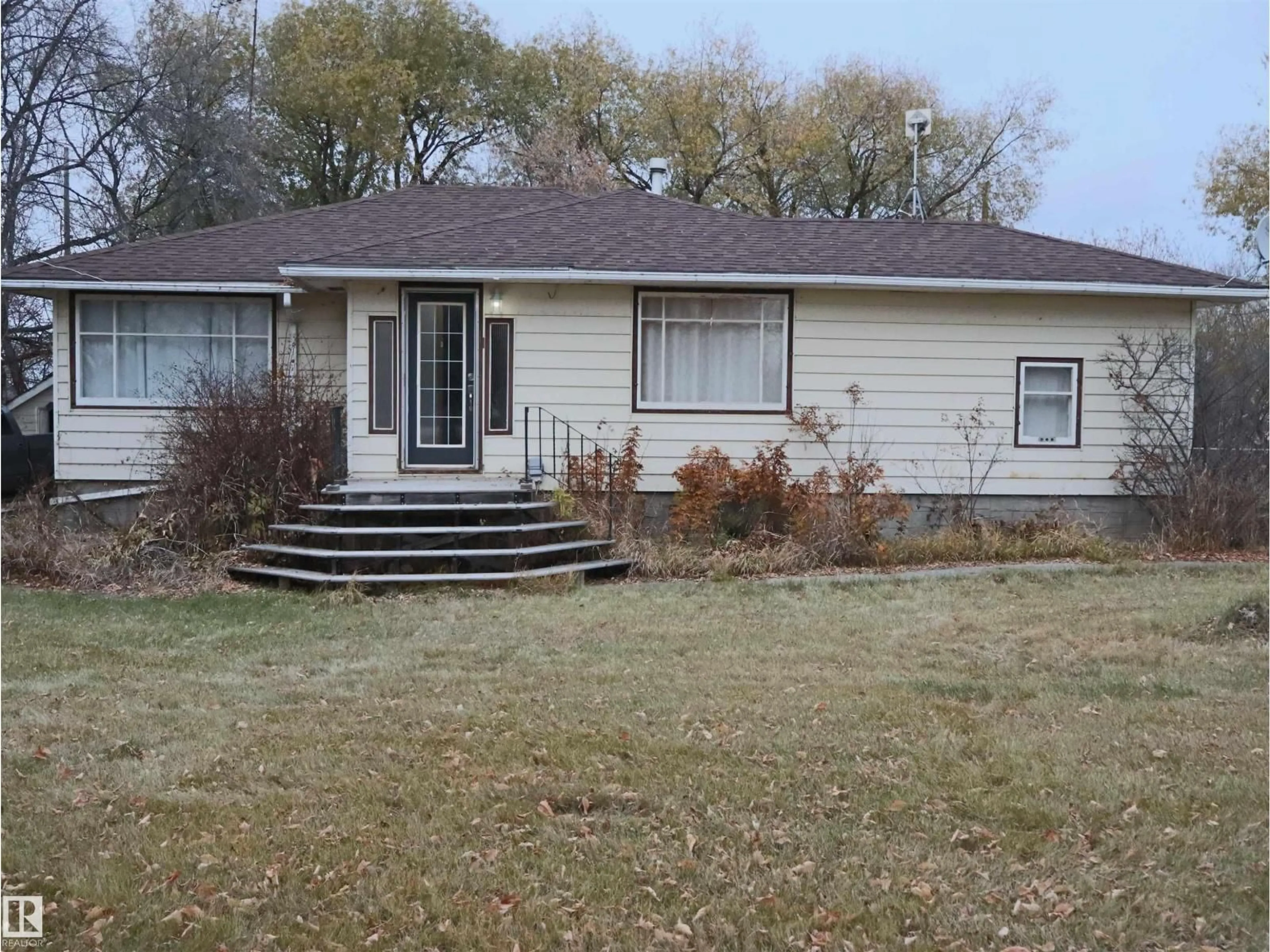 Home with vinyl exterior material, street for 4032A TWP RD 604, Rural Barrhead County Alberta T0G0G0