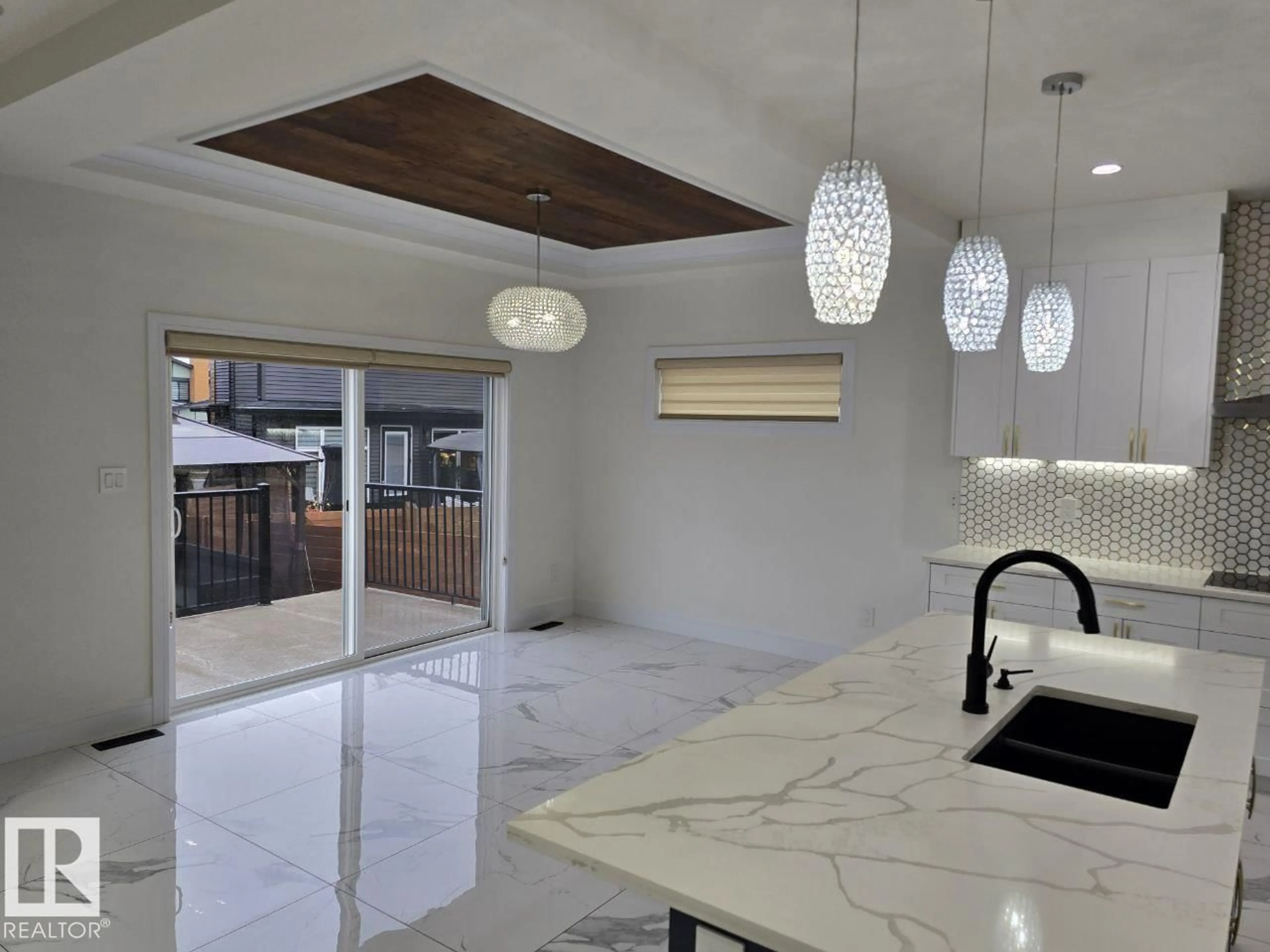 Open concept kitchen, ceramic/tile floor for 228 36 ST SW, Edmonton Alberta T6X2W5