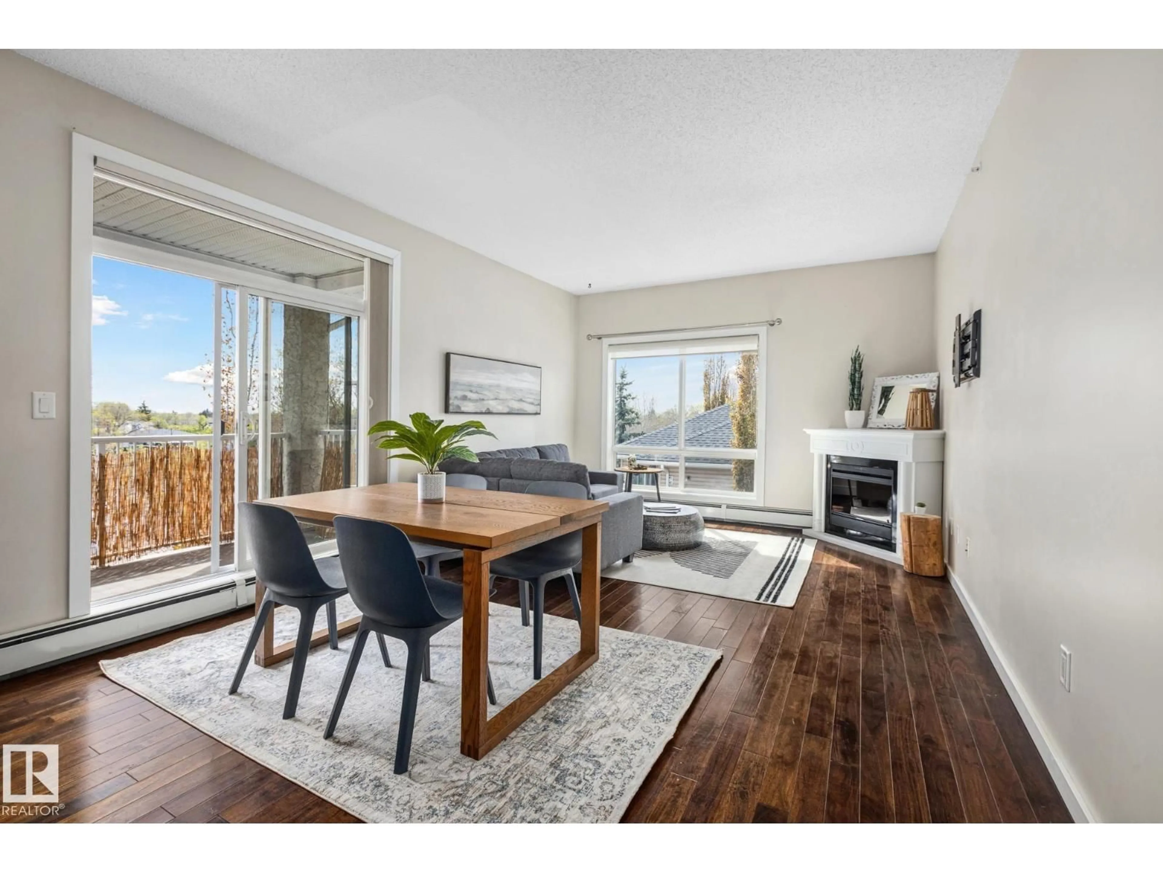 Living room with furniture, wood/laminate floor for #402 - 10524 77 AV, Edmonton Alberta T6E1N1