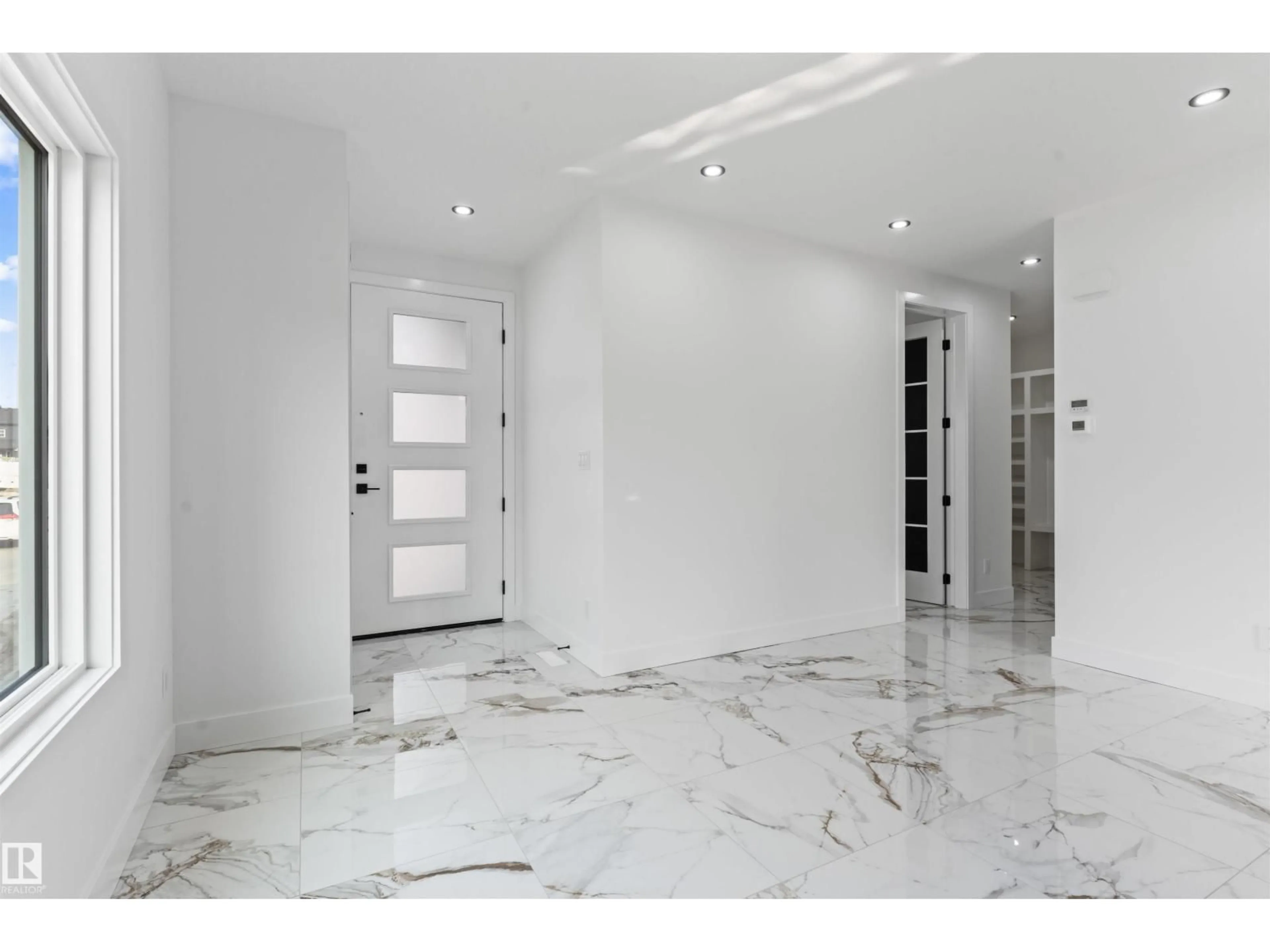 Indoor foyer for 221 CRYSTAL CREEK DR, Leduc Alberta T9E0X6