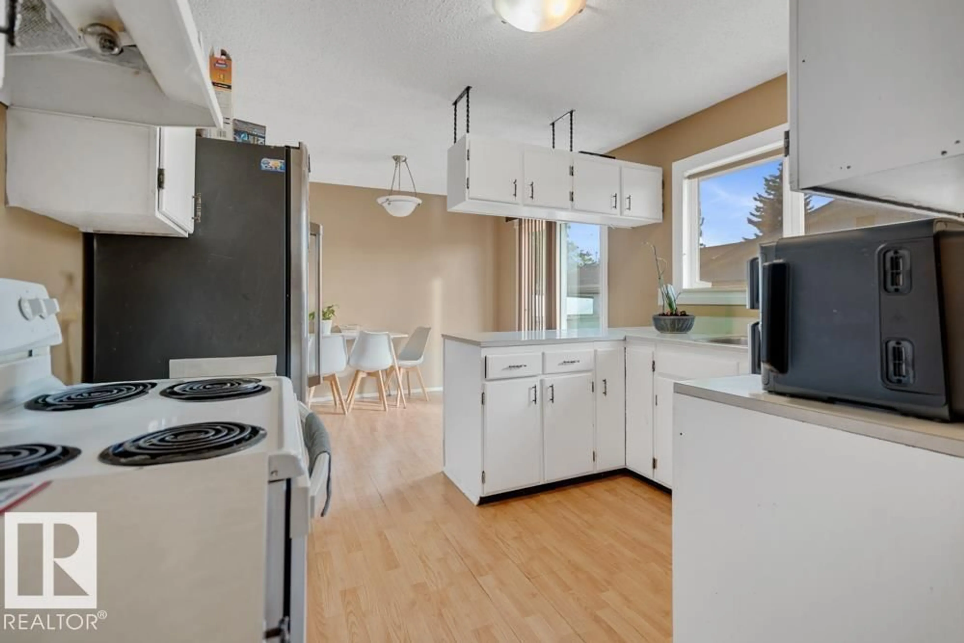 Open concept kitchen, unknown for 10627 168 AV, Edmonton Alberta T5X2R7