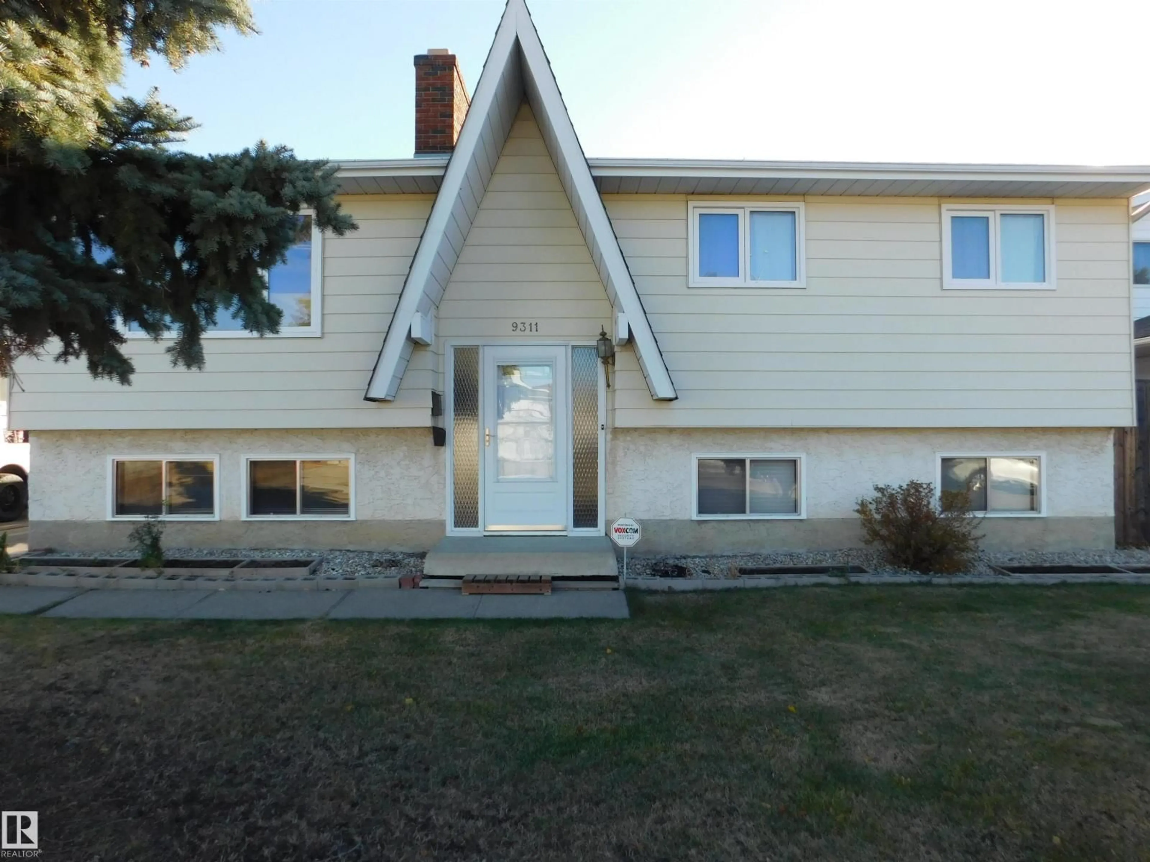 Home with vinyl exterior material, street for NW - 9311 187 ST, Edmonton Alberta T5T1R8
