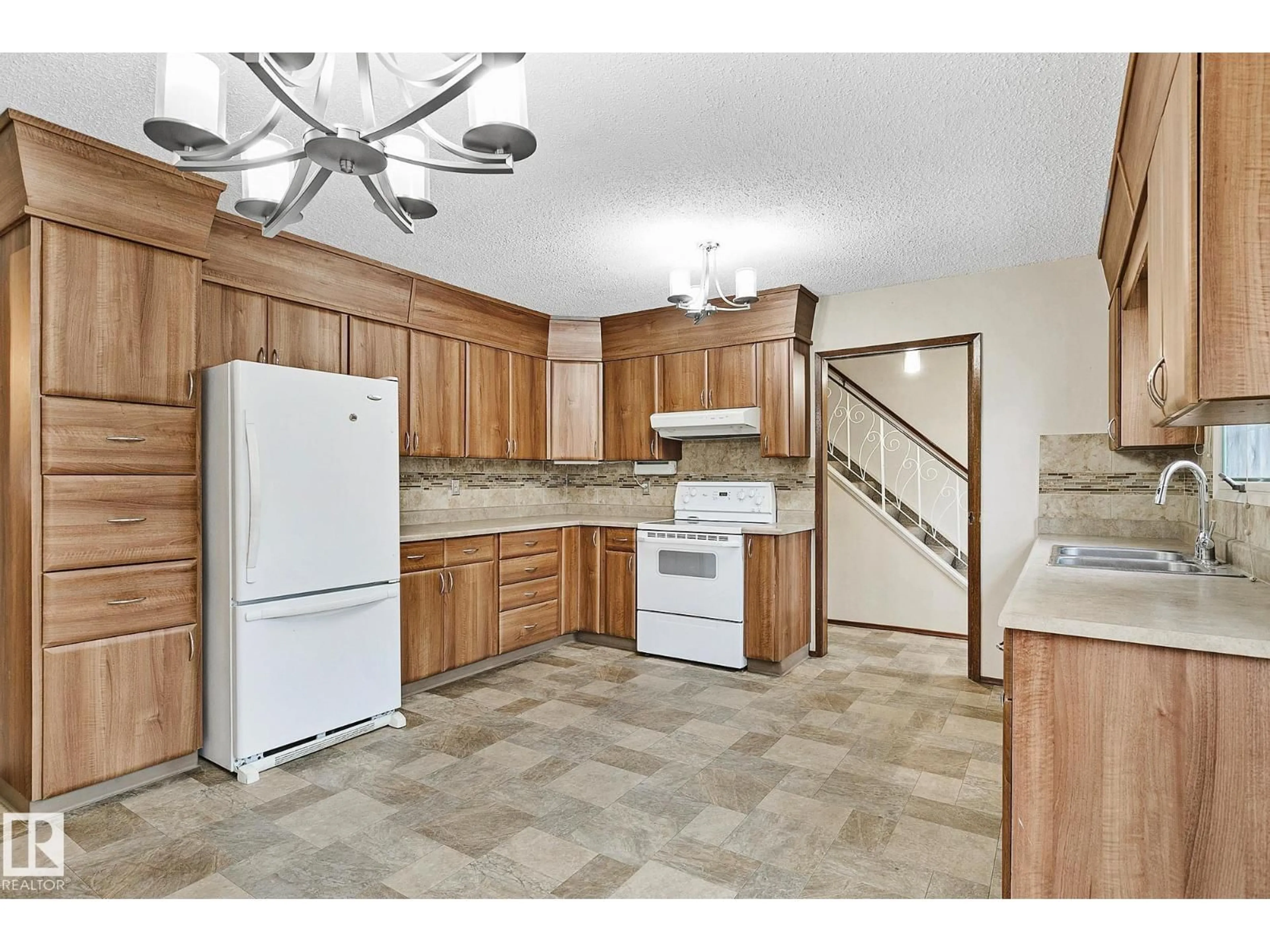 Open concept kitchen, ceramic/tile floor for 186 WILLOW WY, Edmonton Alberta T5T1C8