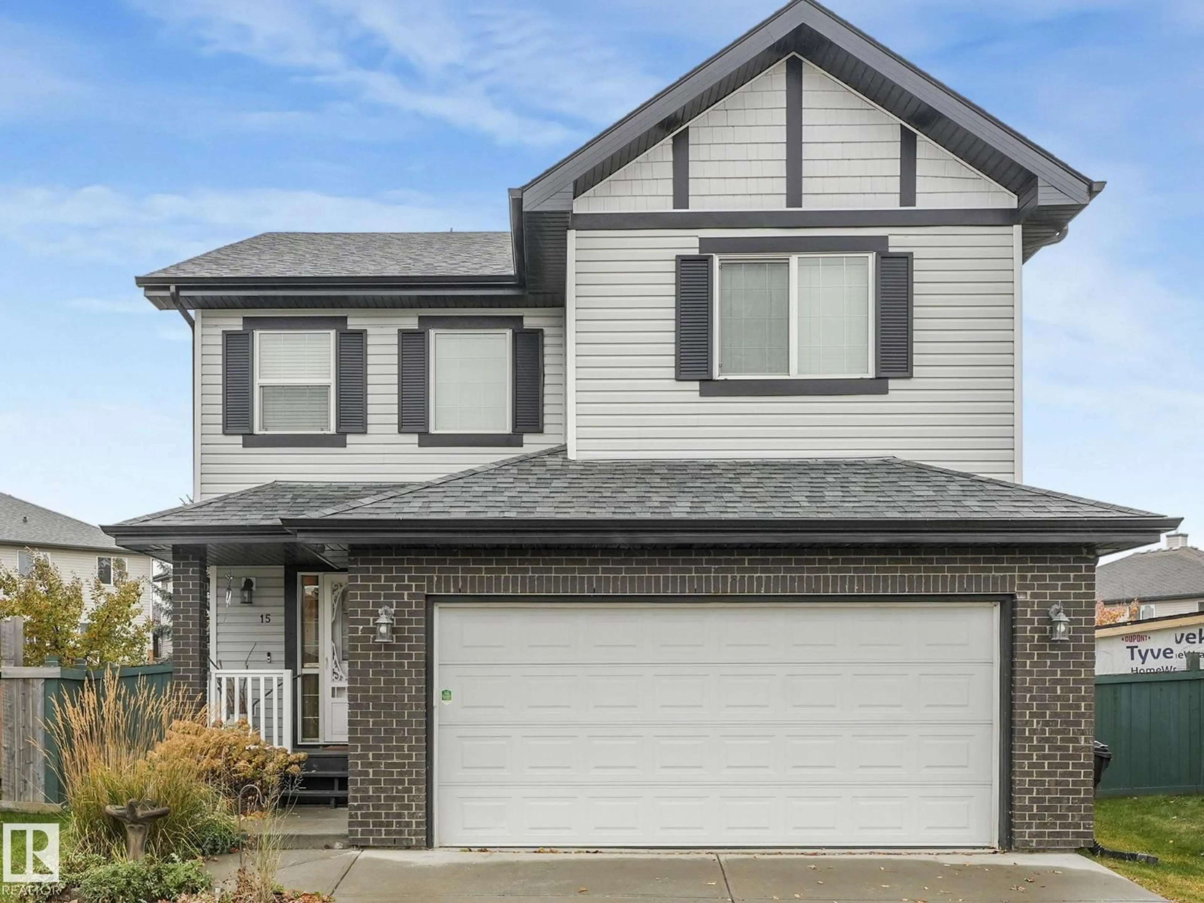 Home with vinyl exterior material, street for 15 VIRGINIA LO, Spruce Grove Alberta T7X0B8