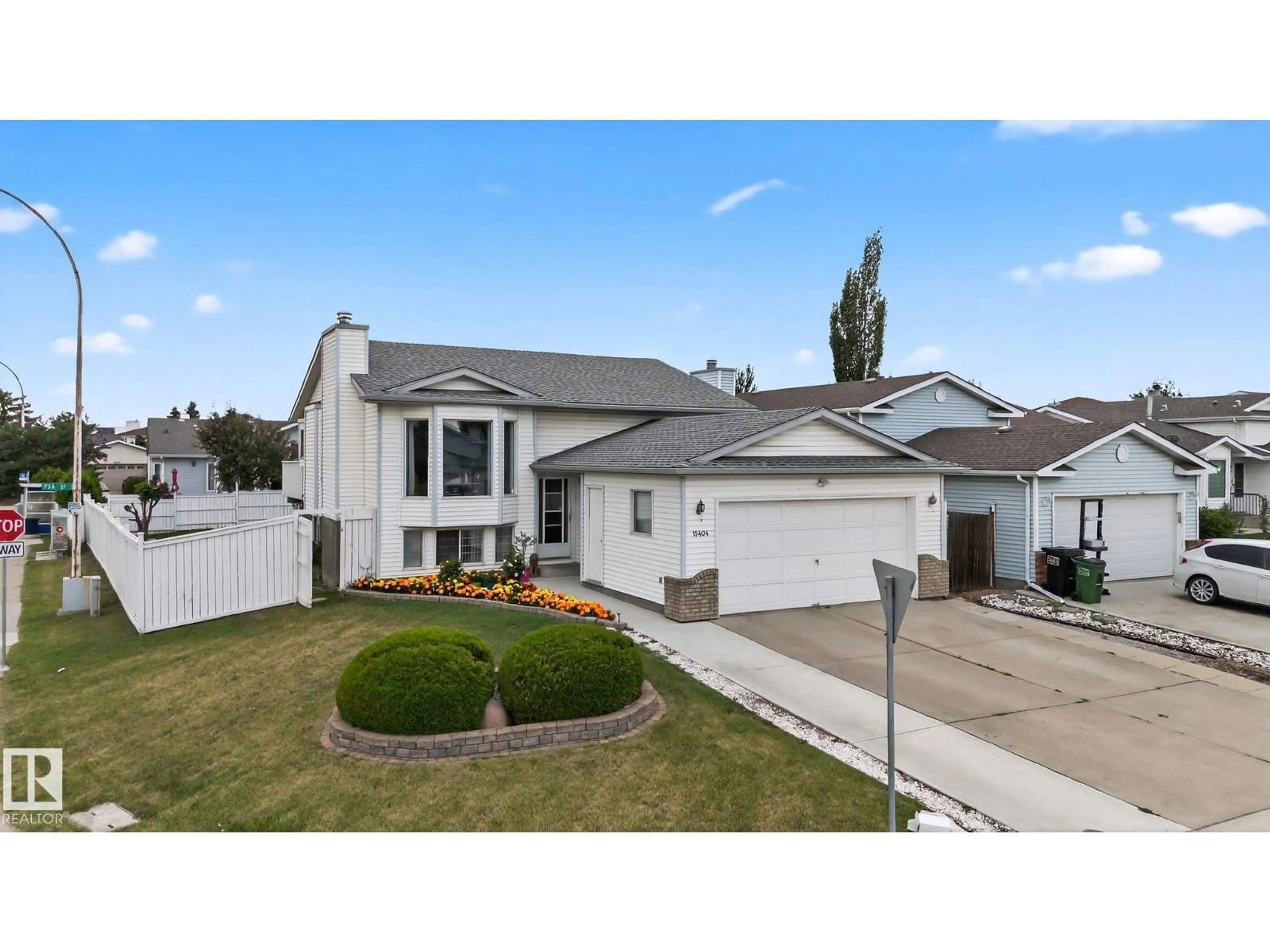 Home with vinyl exterior material, street for 15404 73 ST, Edmonton Alberta T5Z2X9