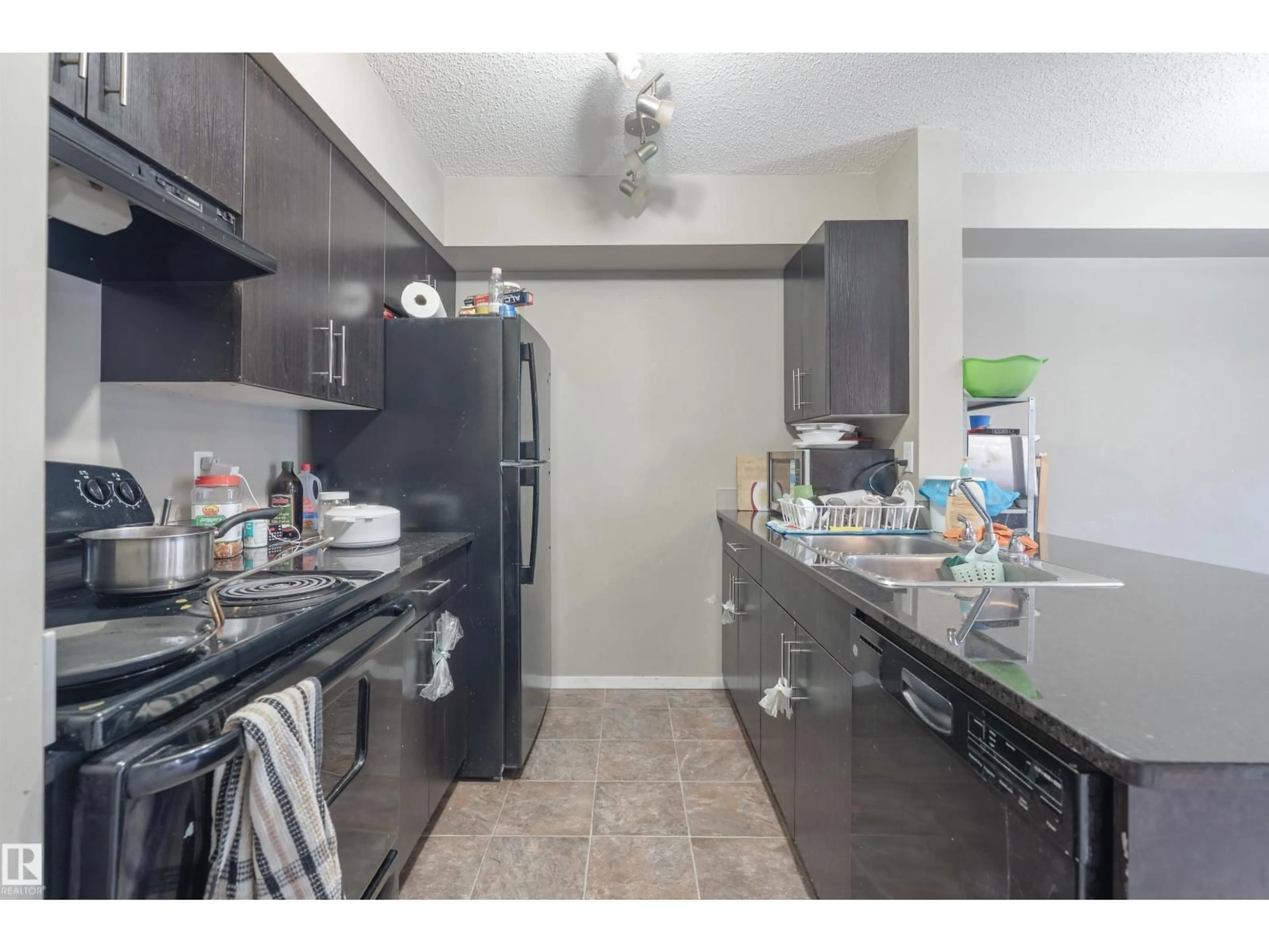 Standard kitchen, unknown for 206 - 3207 JAMES MOWATT TR, Edmonton Alberta T6W3L6
