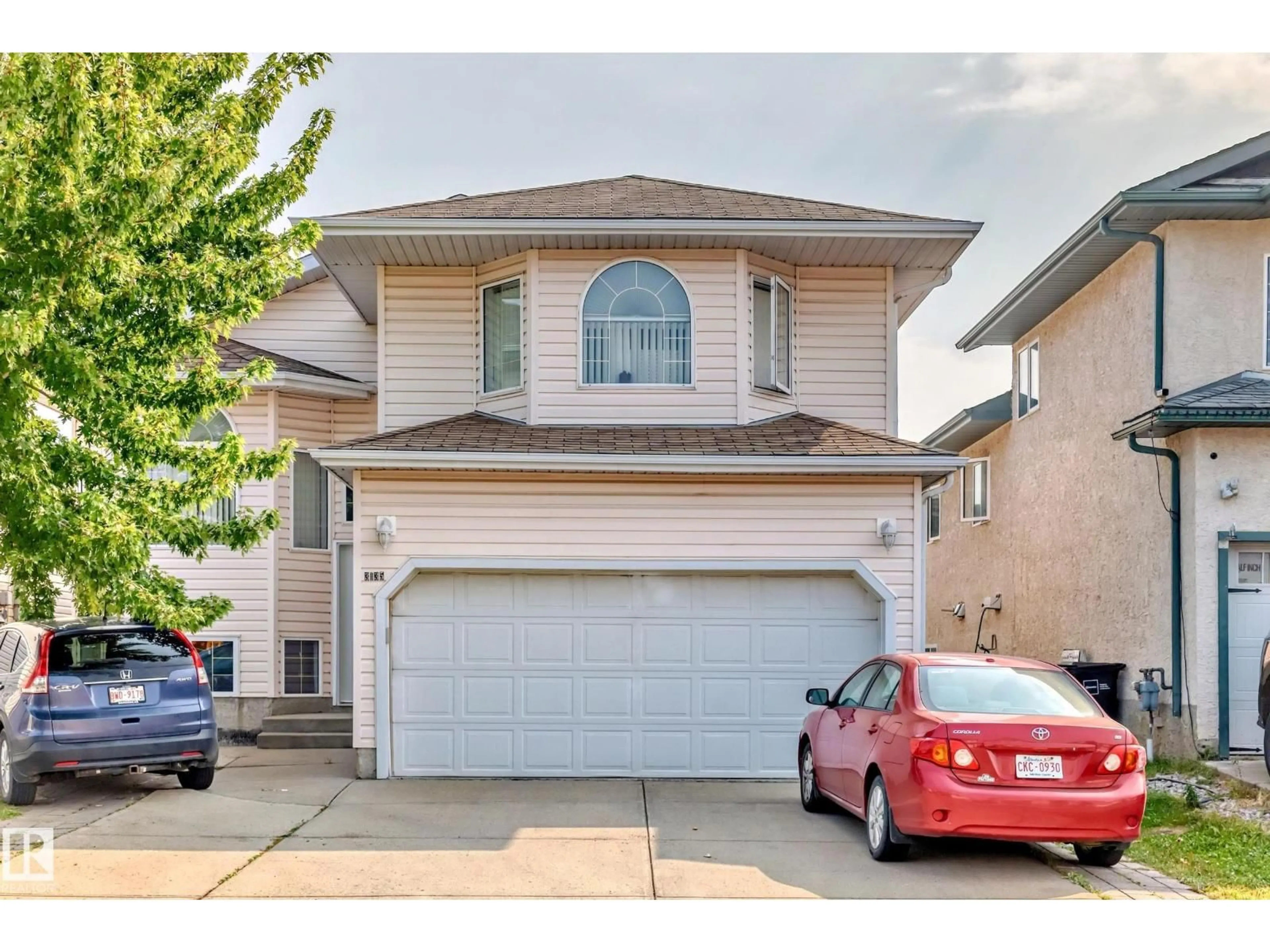 Home with vinyl exterior material, street for NW - 3135 34B AV, Edmonton Alberta T6T1T6