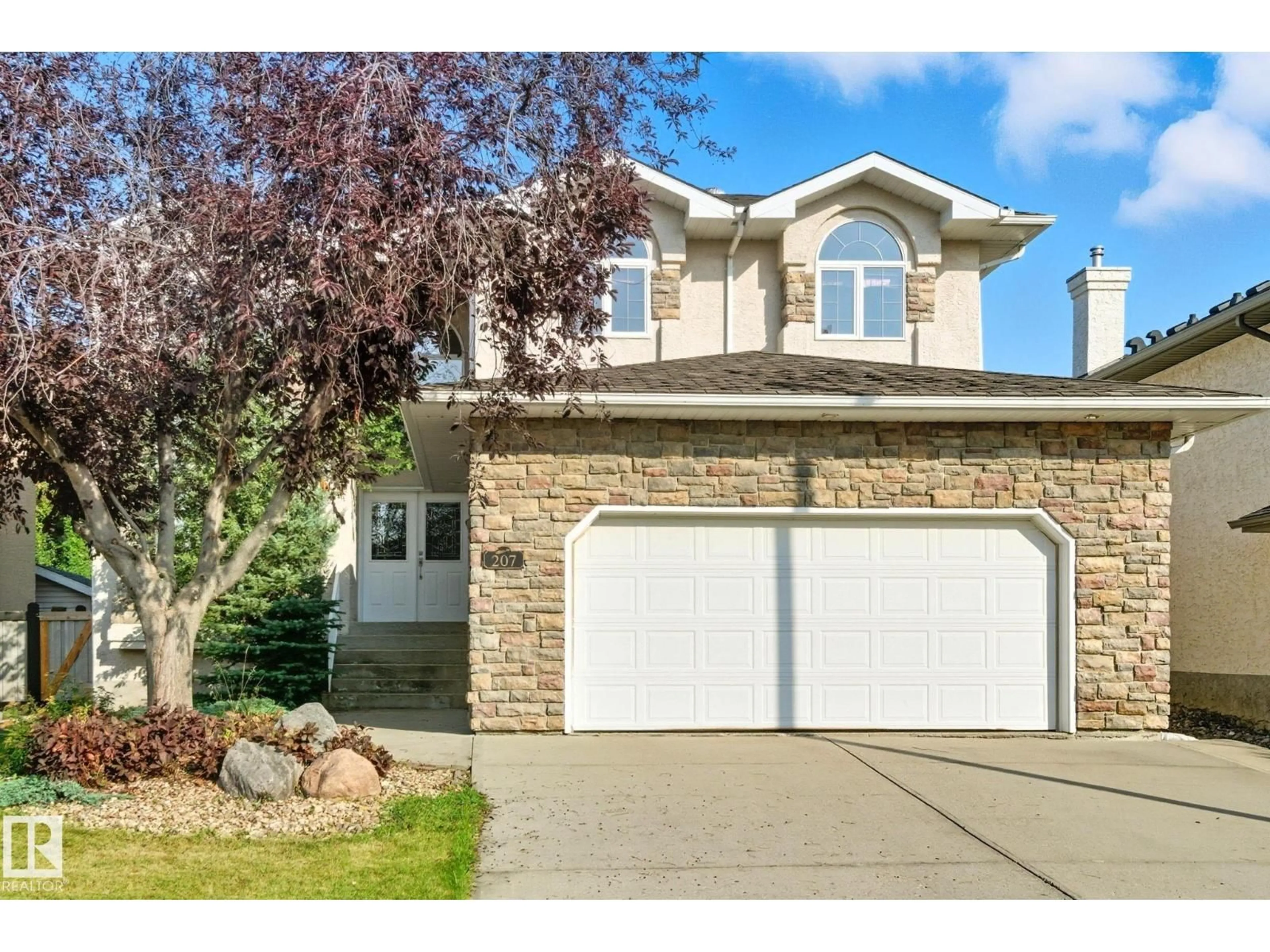 Home with vinyl exterior material, street for LI NW - 207 FALCONER LINK, Edmonton Alberta T6R2V7