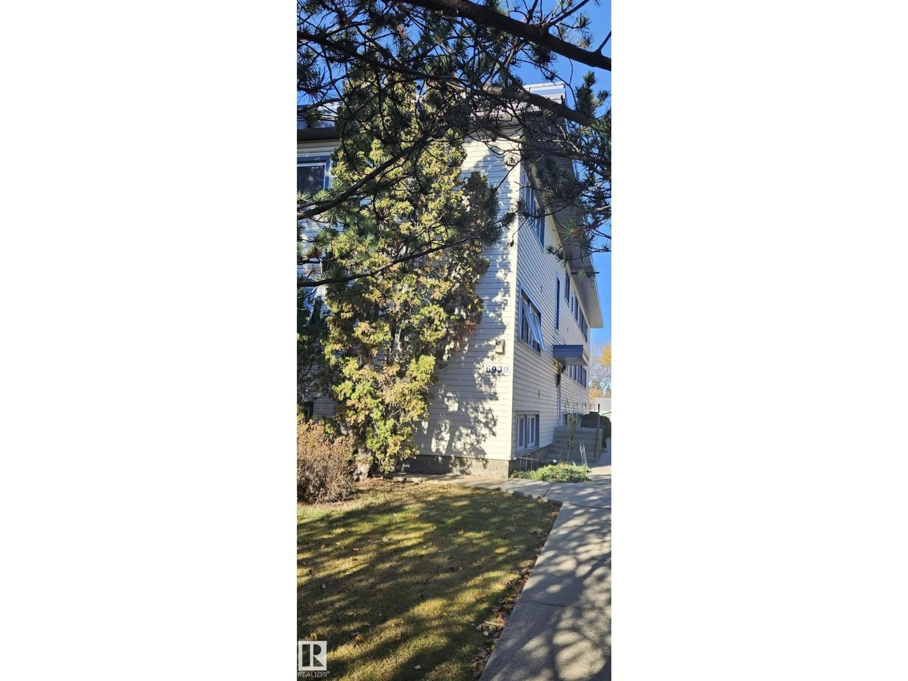 A pic from outside/outdoor area/front of a property/back of a property/a pic from drone, unknown for #9 - 6920 101 AV, Edmonton Alberta T6A0H7