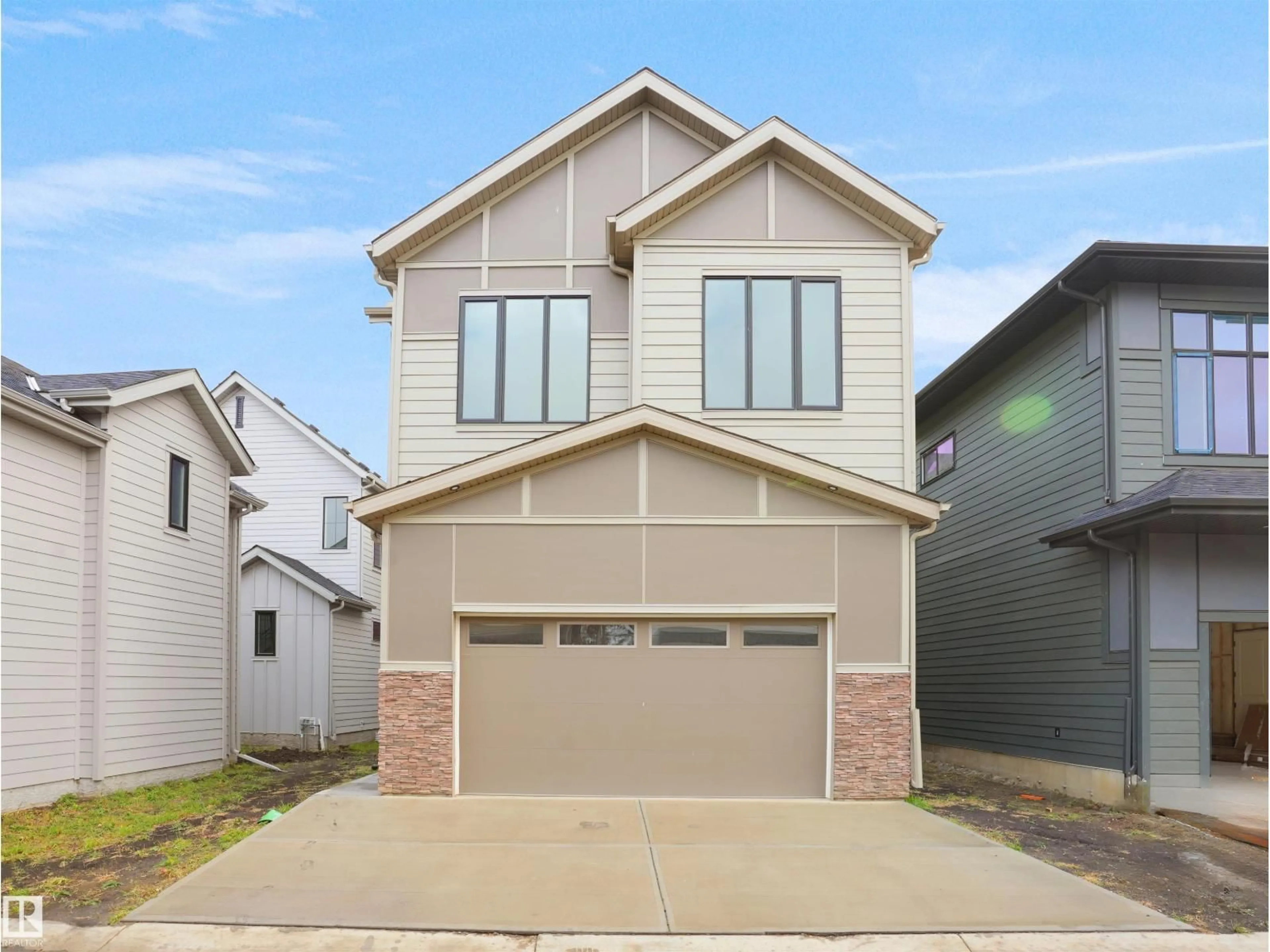 Home with vinyl exterior material, street for 6724 CRAWFORD WY, Edmonton Alberta T6W1A6