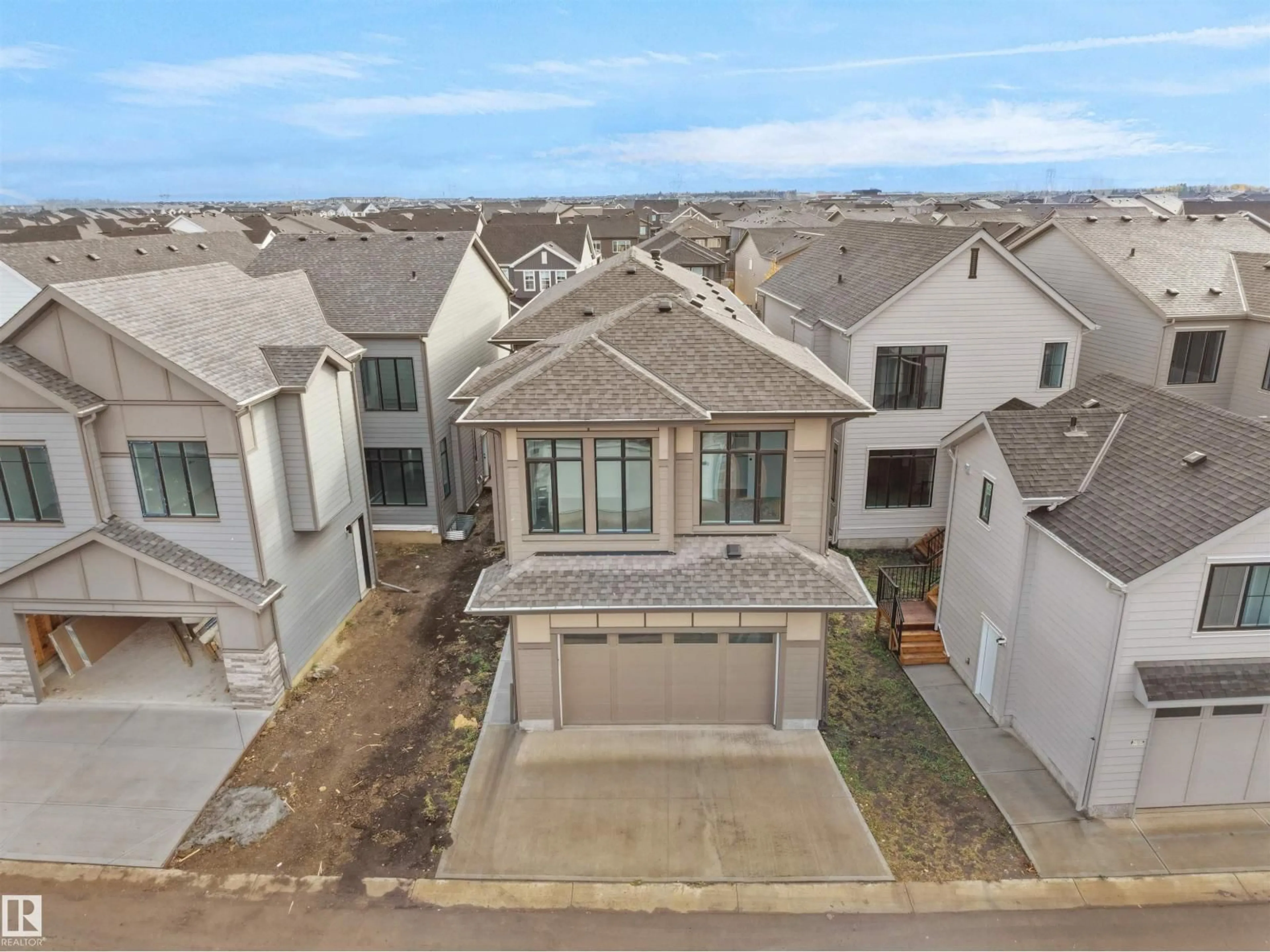A pic from outside/outdoor area/front of a property/back of a property/a pic from drone, street for 6724 CRAWFORD WY, Edmonton Alberta T6W1A6