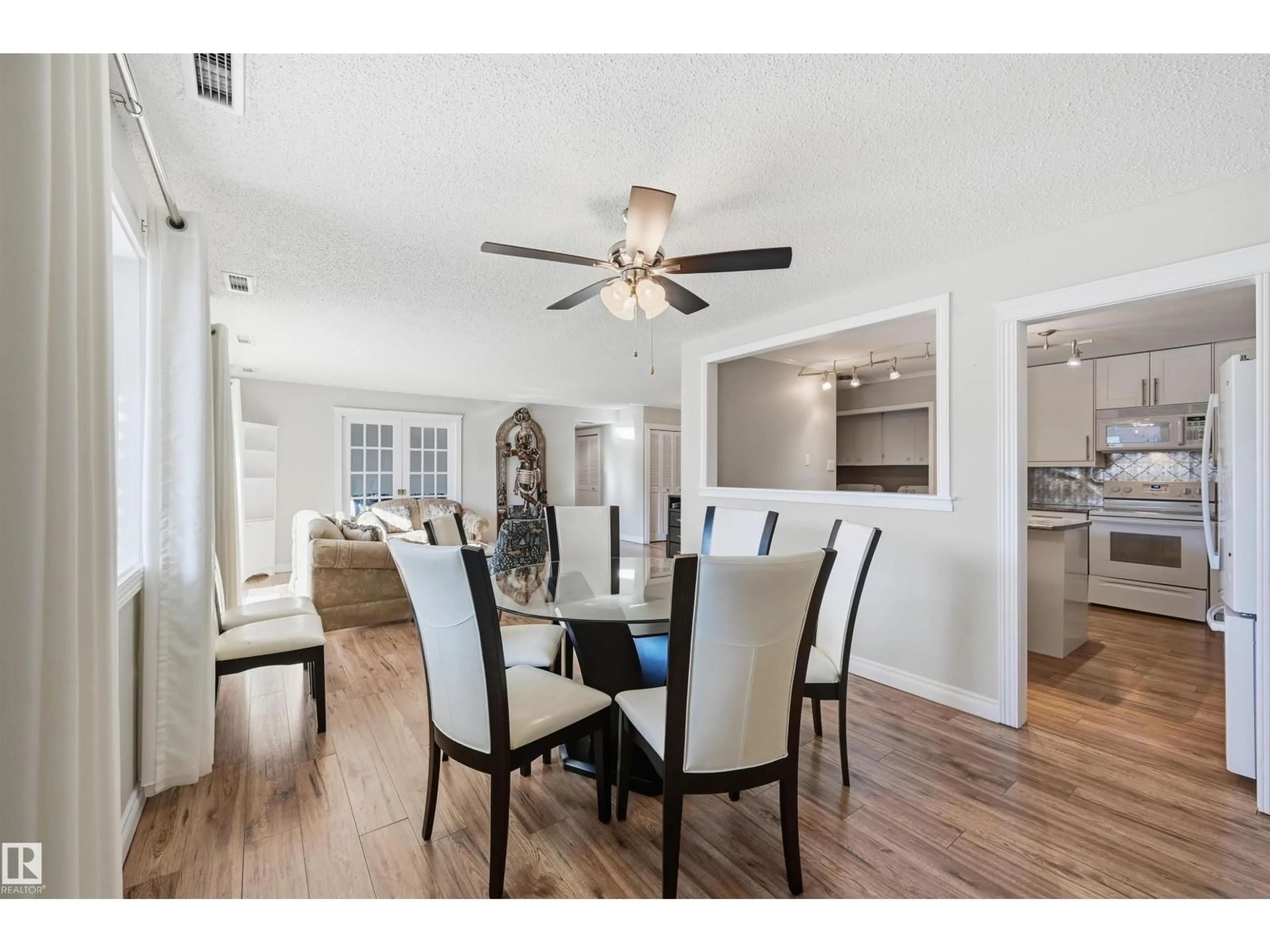 Dining room, wood/laminate floor for #204 - 14810 51 AV, Edmonton Alberta T6H5G5