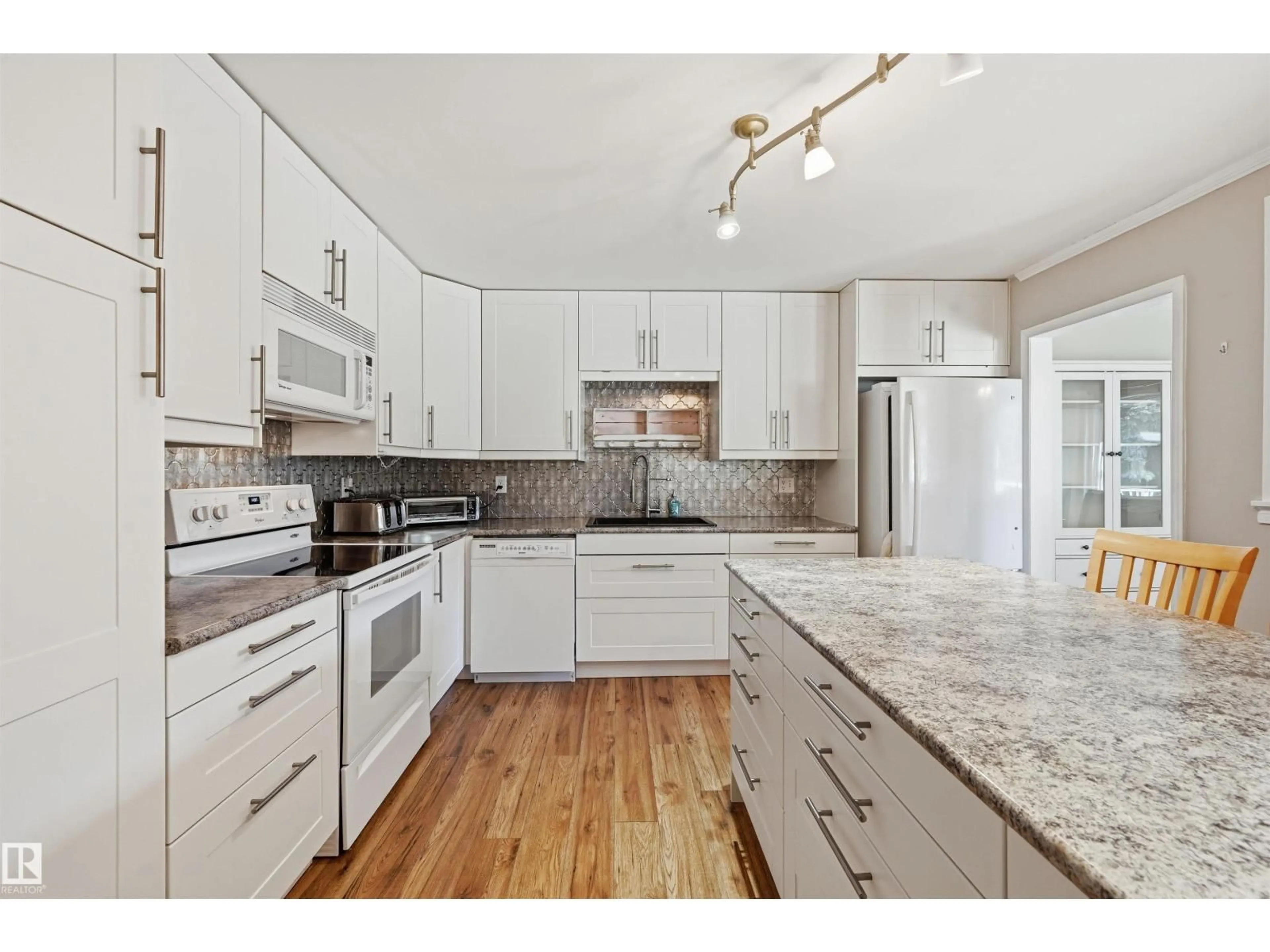 Open concept kitchen, unknown for #204 - 14810 51 AV, Edmonton Alberta T6H5G5