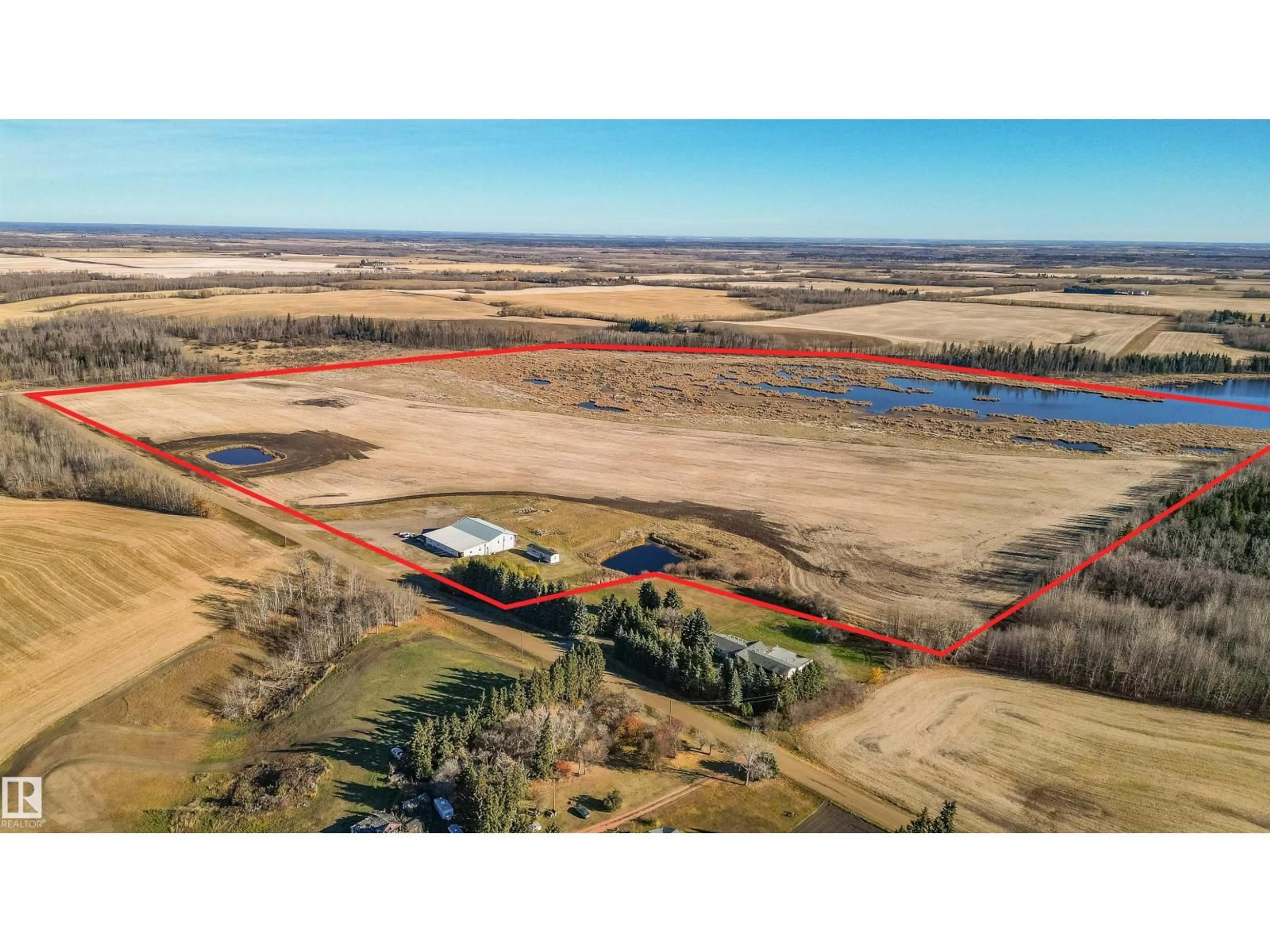 A pic from outside/outdoor area/front of a property/back of a property/a pic from drone, water/lake/river/ocean view for 57119 RGE RD 241, Rural Sturgeon County Alberta T0A0K1
