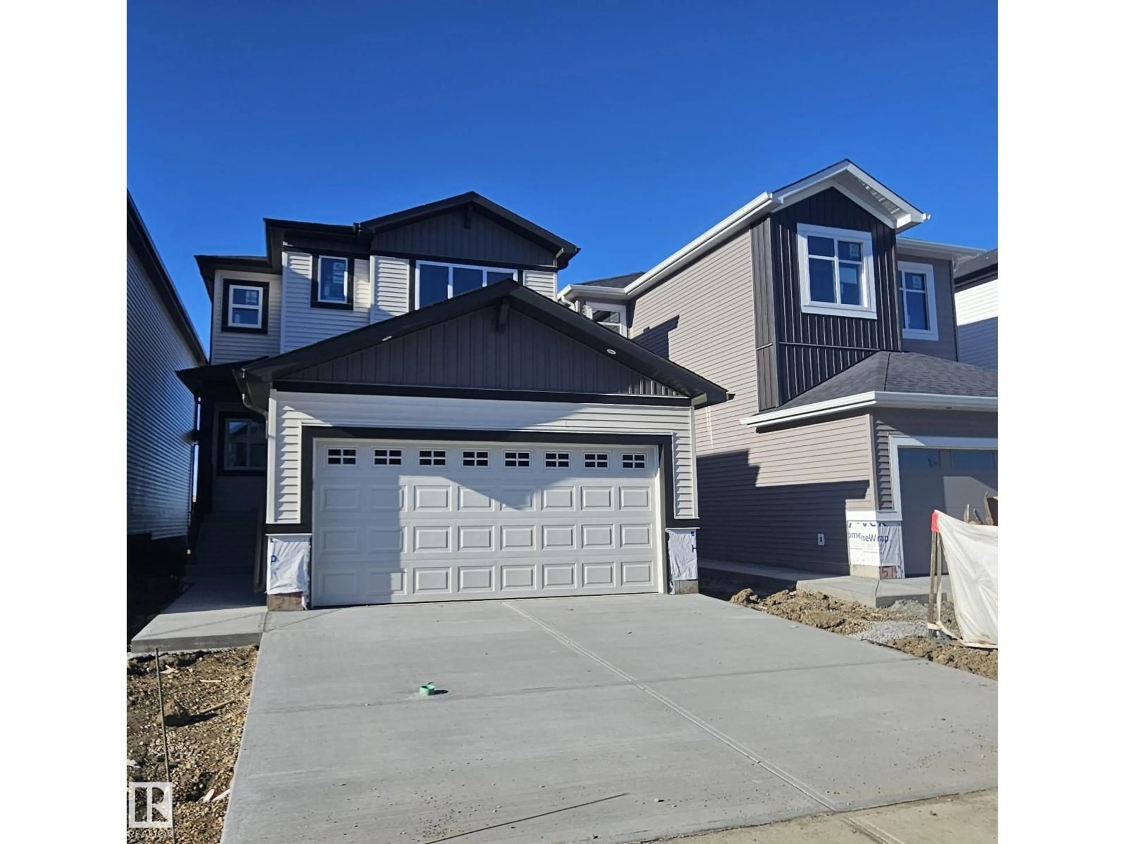 Home with vinyl exterior material, street for 4116 67 ST, Beaumont Alberta T4X3E9