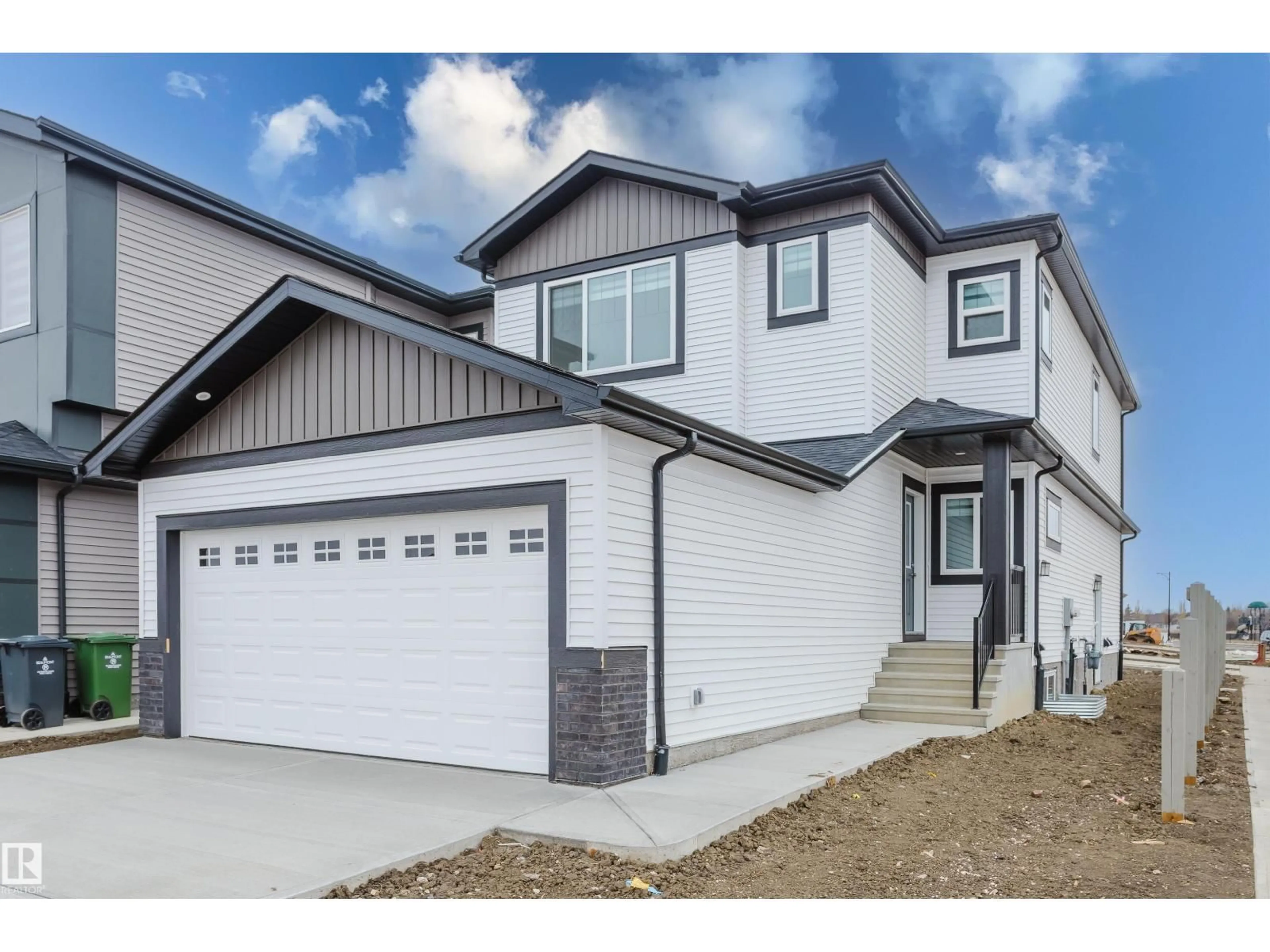 Home with vinyl exterior material, street for 4201 66 ST, Beaumont Alberta T4X3E8