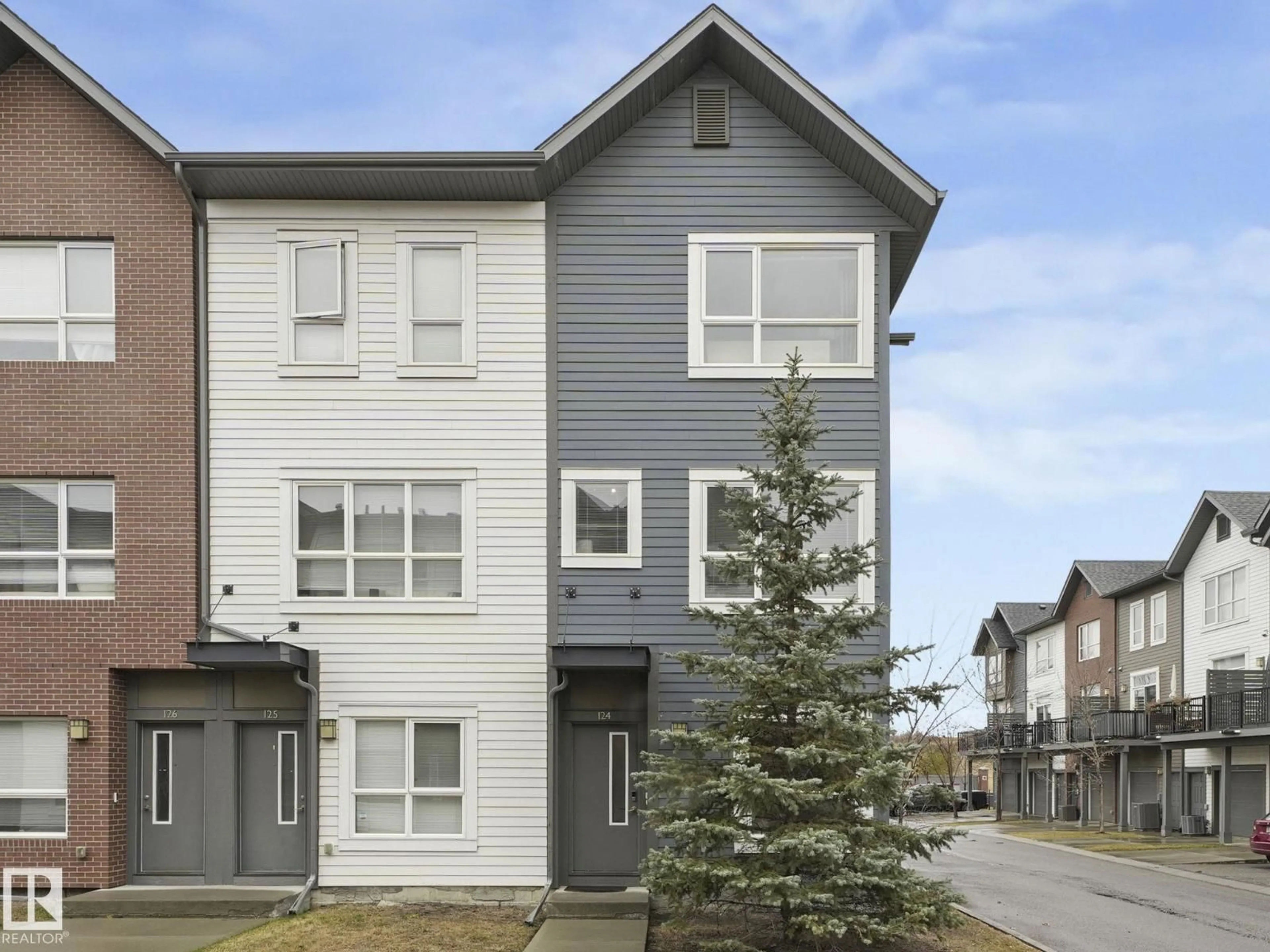 Home with vinyl exterior material, street for 124 2560 PEGASUS BV NW, Edmonton Alberta T5E6V4