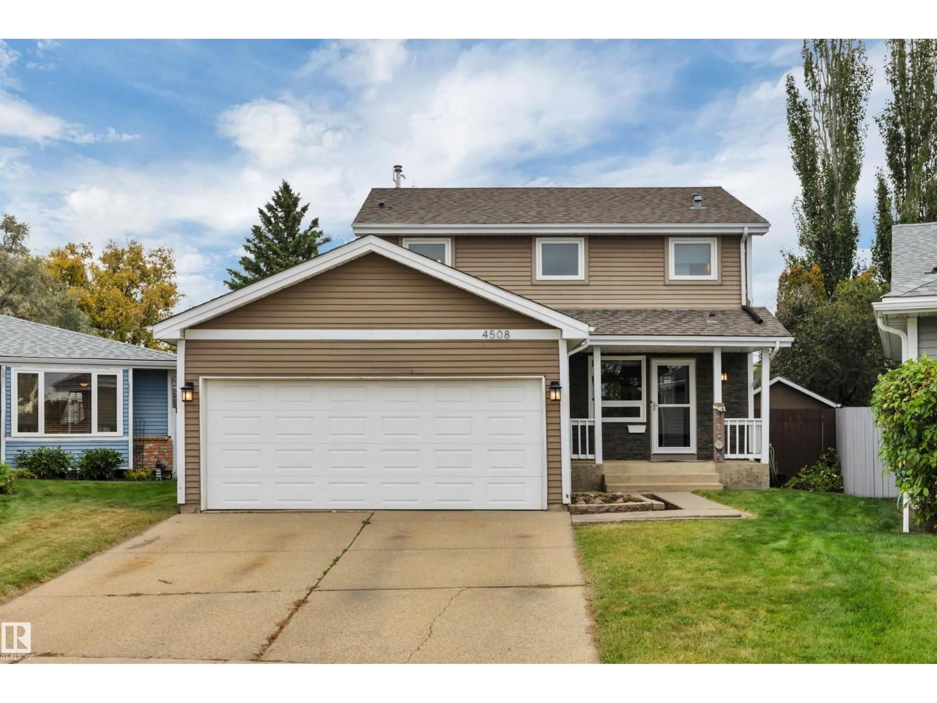 Home with vinyl exterior material, street for NW - 4508 32A AV, Edmonton Alberta T6L4W8