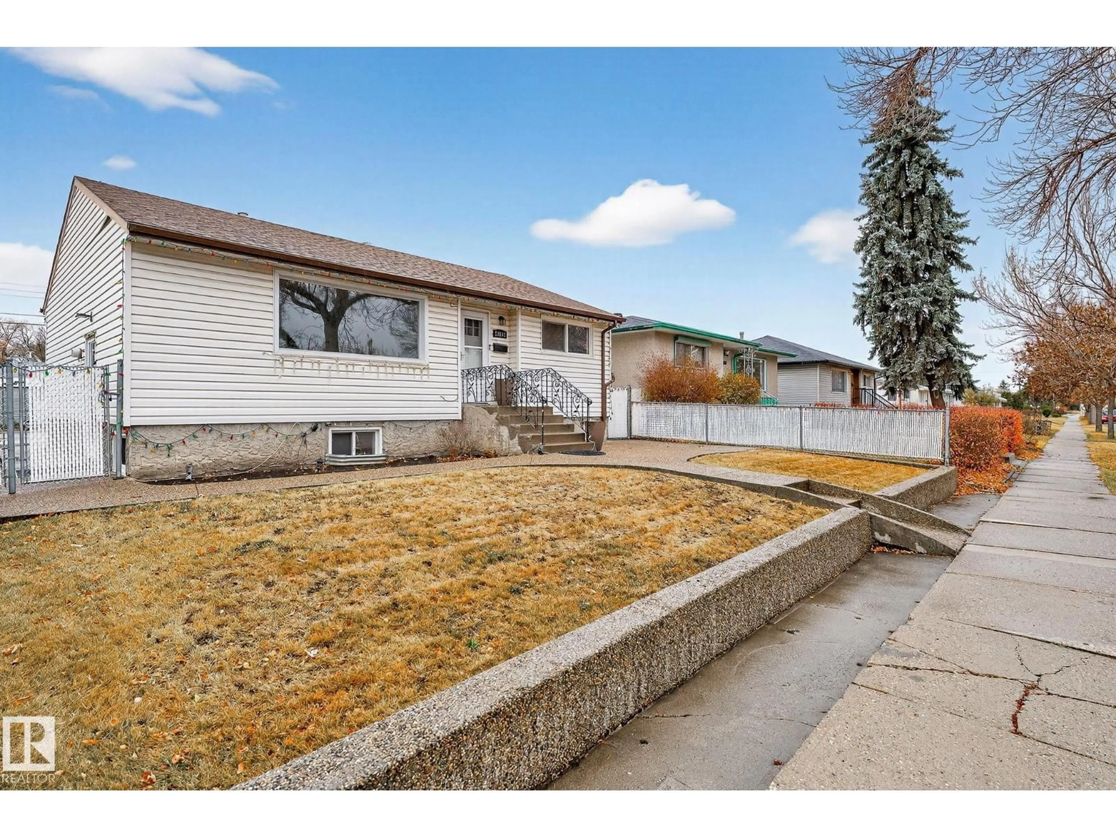 Home with vinyl exterior material, street for 13108 62 ST, Edmonton Alberta T5A0V4