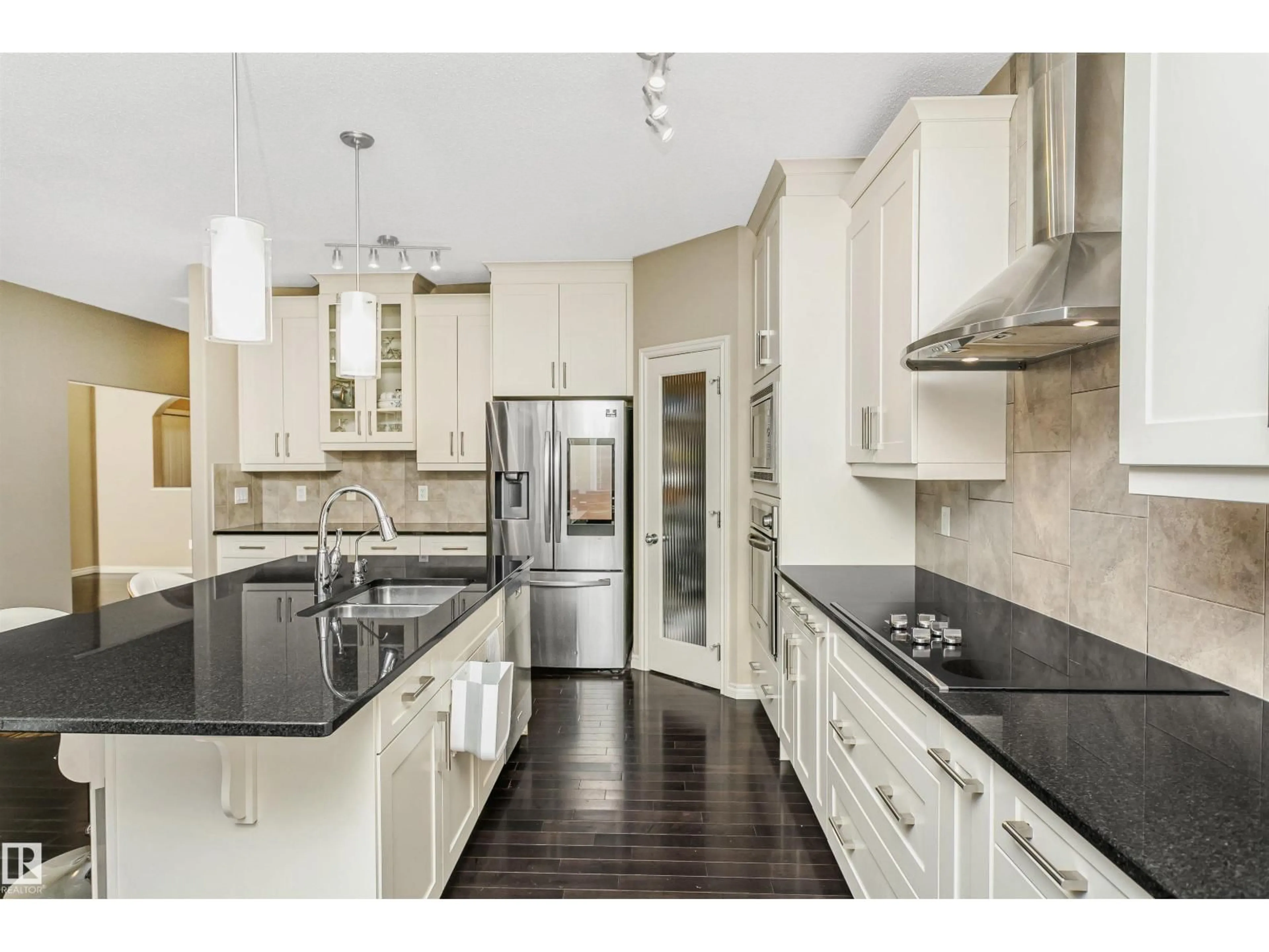 Open concept kitchen, ceramic/tile floor for 1007 173 ST, Edmonton Alberta T6W1Z5