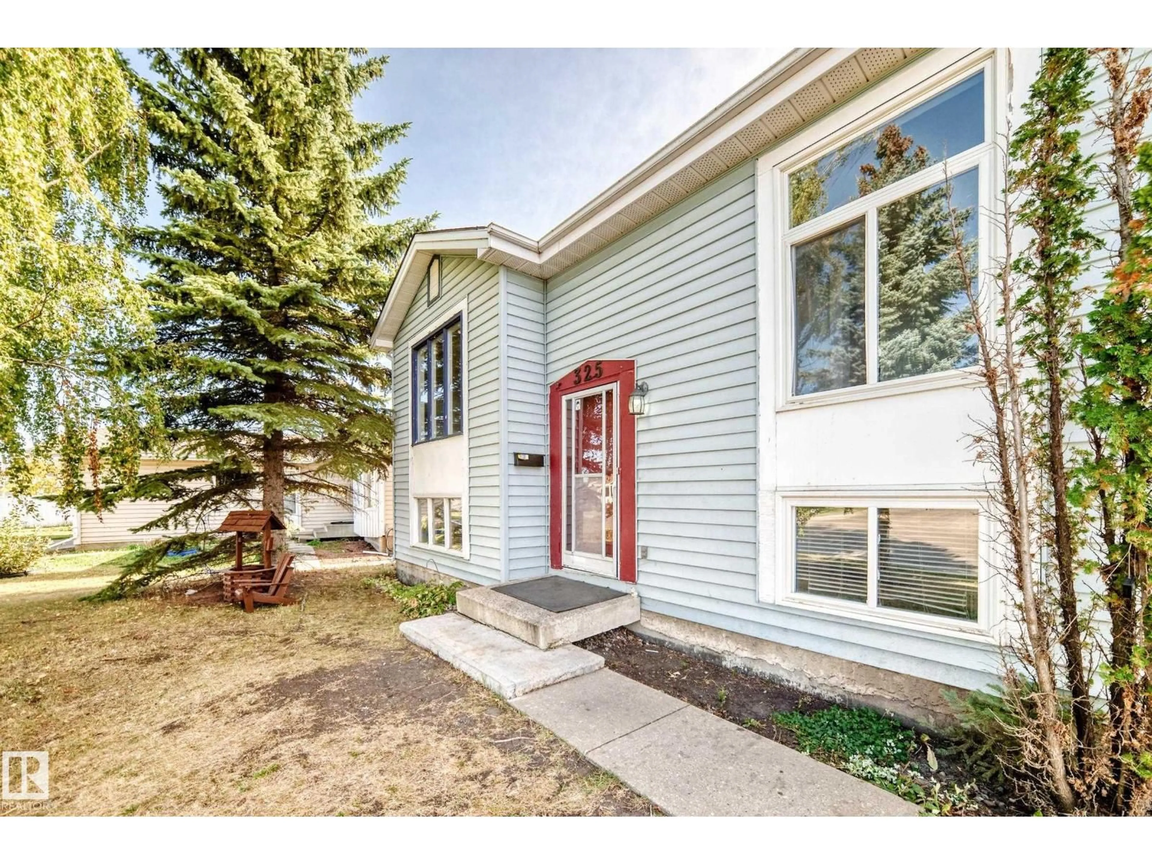Home with vinyl exterior material, street for 325 WARWICK RD, Edmonton Alberta T5X4R1