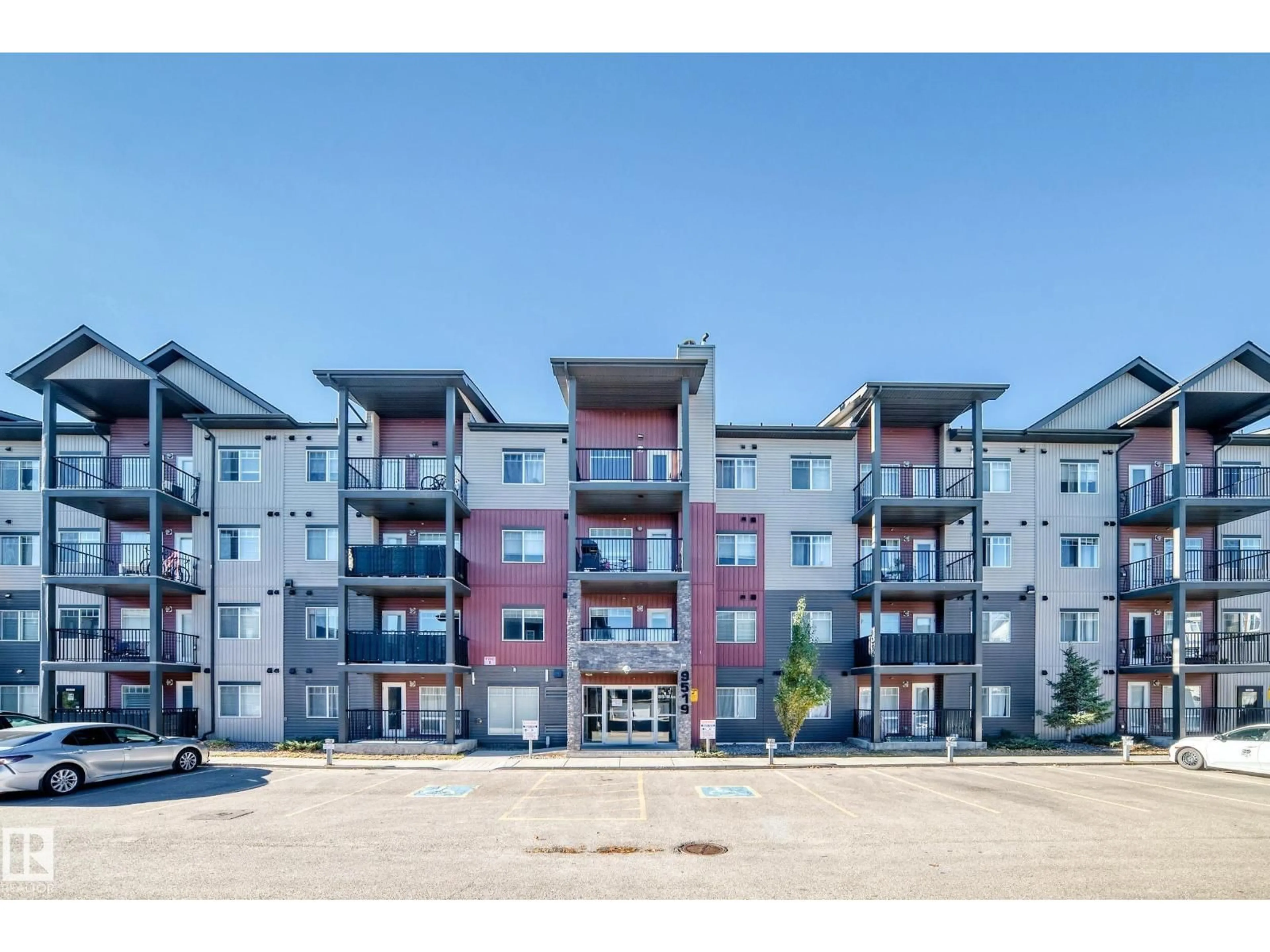 A pic from outside/outdoor area/front of a property/back of a property/a pic from drone, building for #101 - 9519 160 AV, Edmonton Alberta T5Z0N1