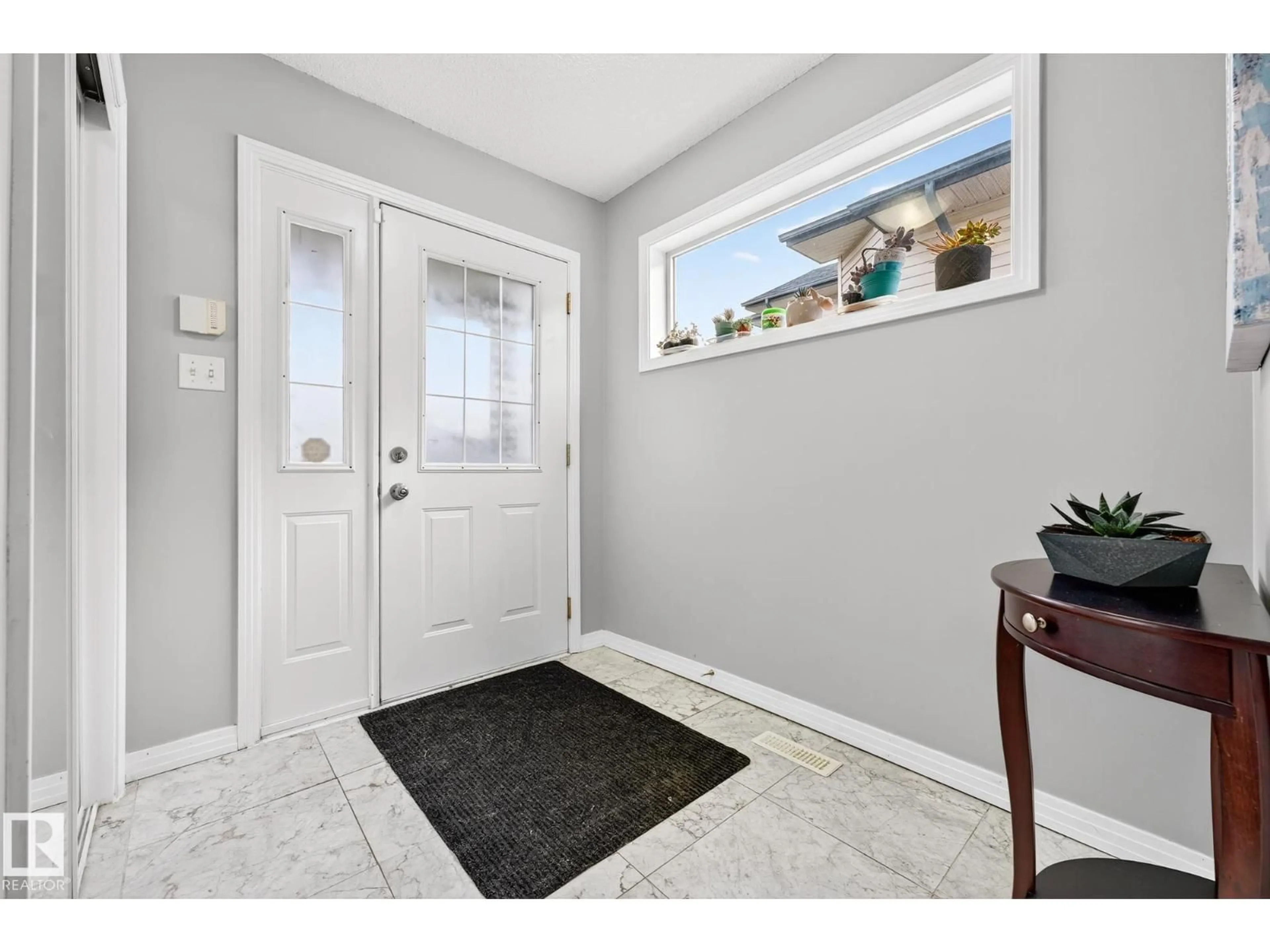 Indoor entryway for NW - 2911 151A AV, Edmonton Alberta T5Y2Y7
