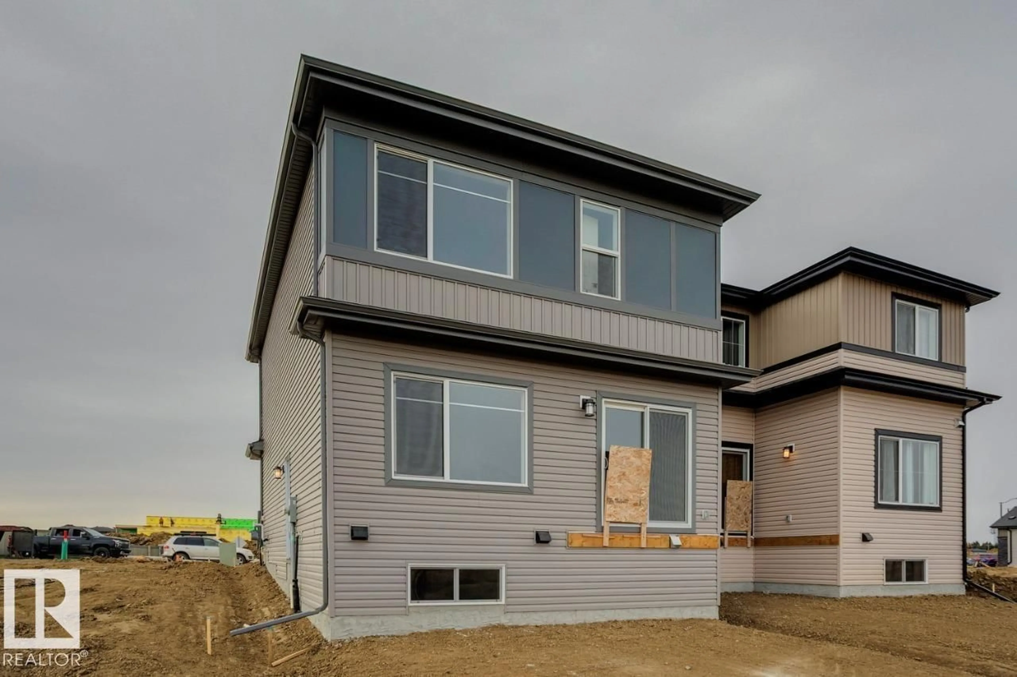 Home with vinyl exterior material, street for 268 LODGE POLE PL, Leduc Alberta T9E0K7
