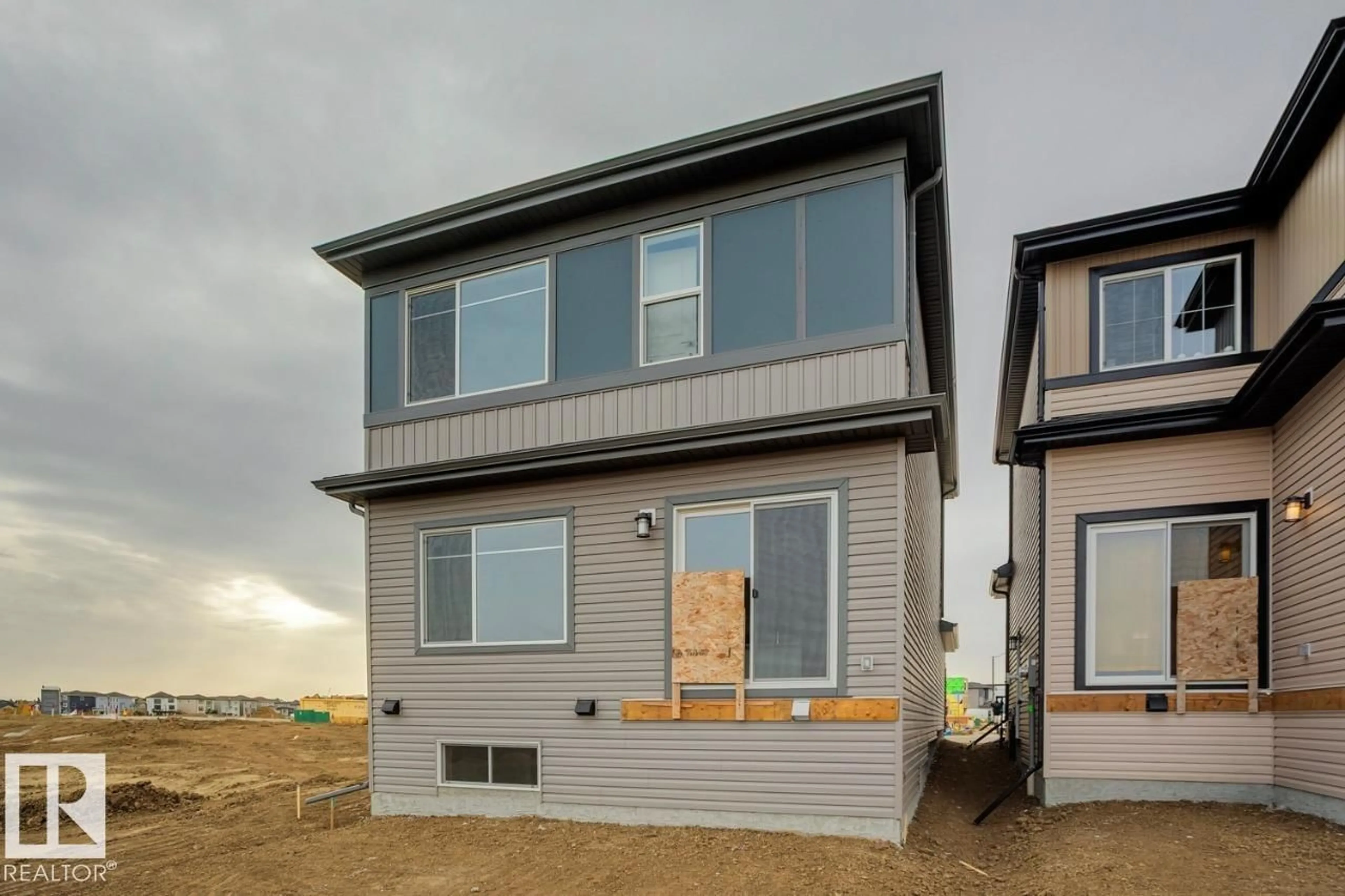 Home with vinyl exterior material, street for 268 LODGE POLE PL, Leduc Alberta T9E0K7