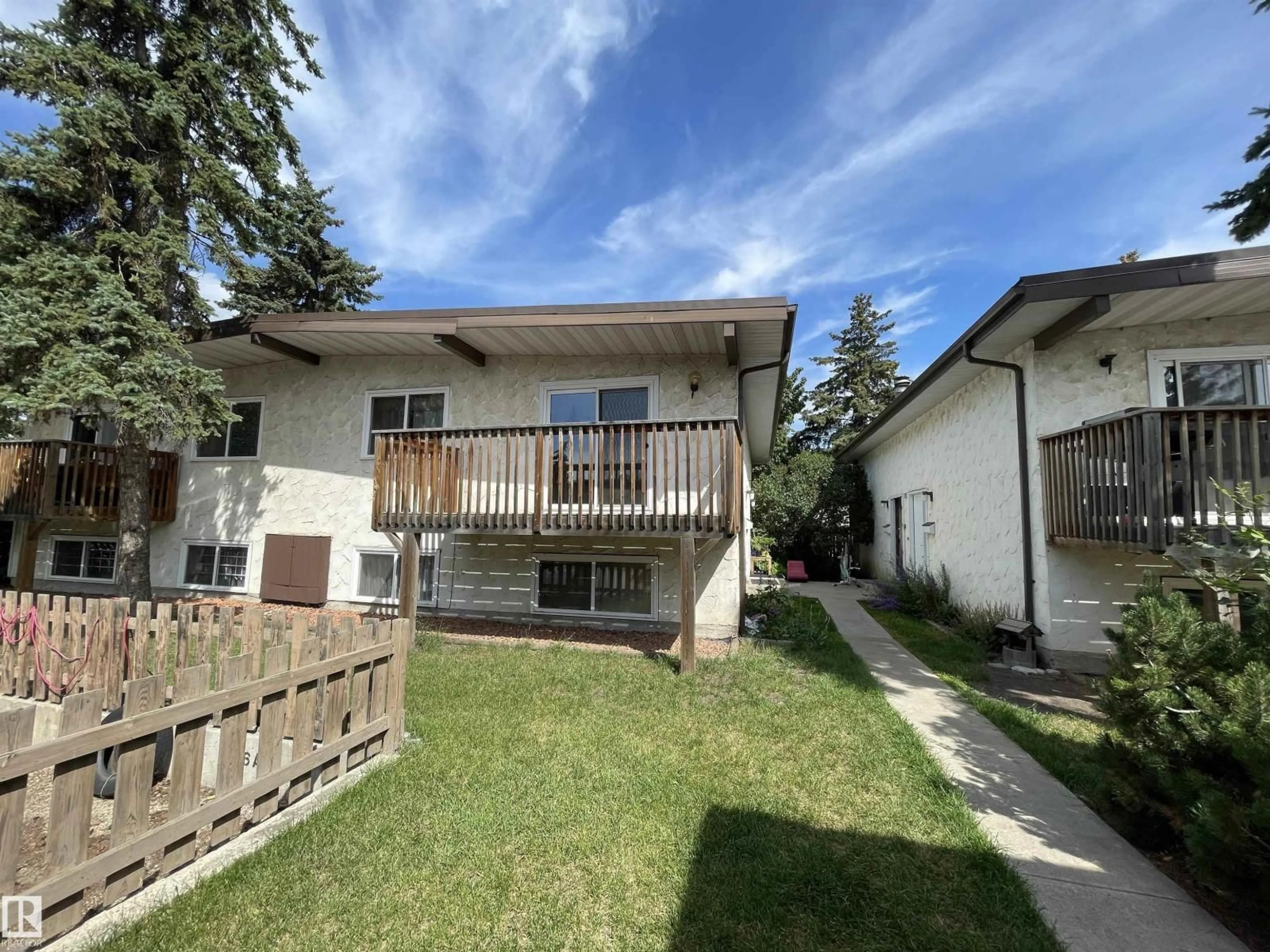 A pic from outside/outdoor area/front of a property/back of a property/a pic from drone, street for 8930B 144 AV, Edmonton Alberta T5E5V4