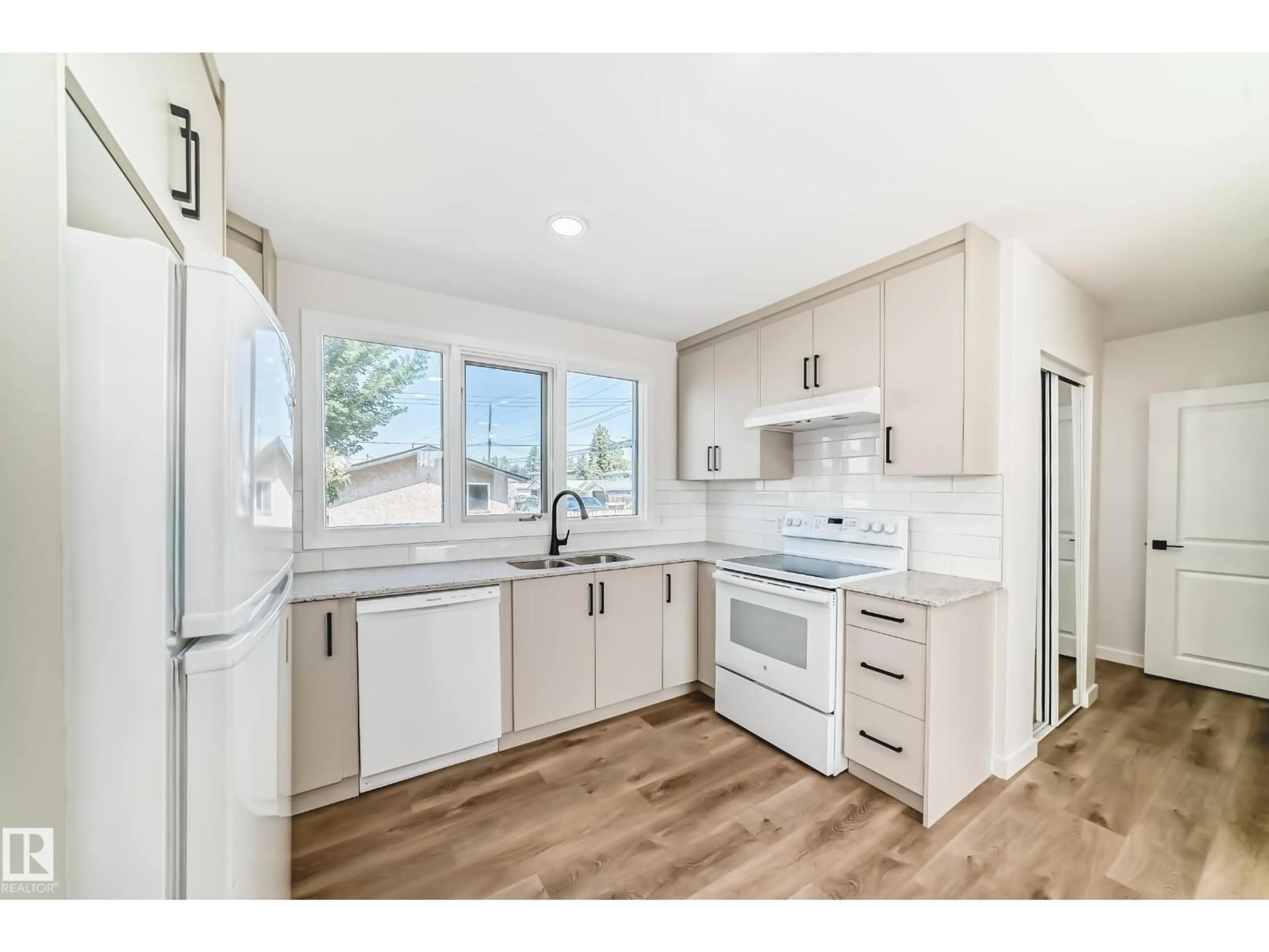 Open concept kitchen, unknown for 10820 132 AV, Edmonton Alberta T5E0Z6