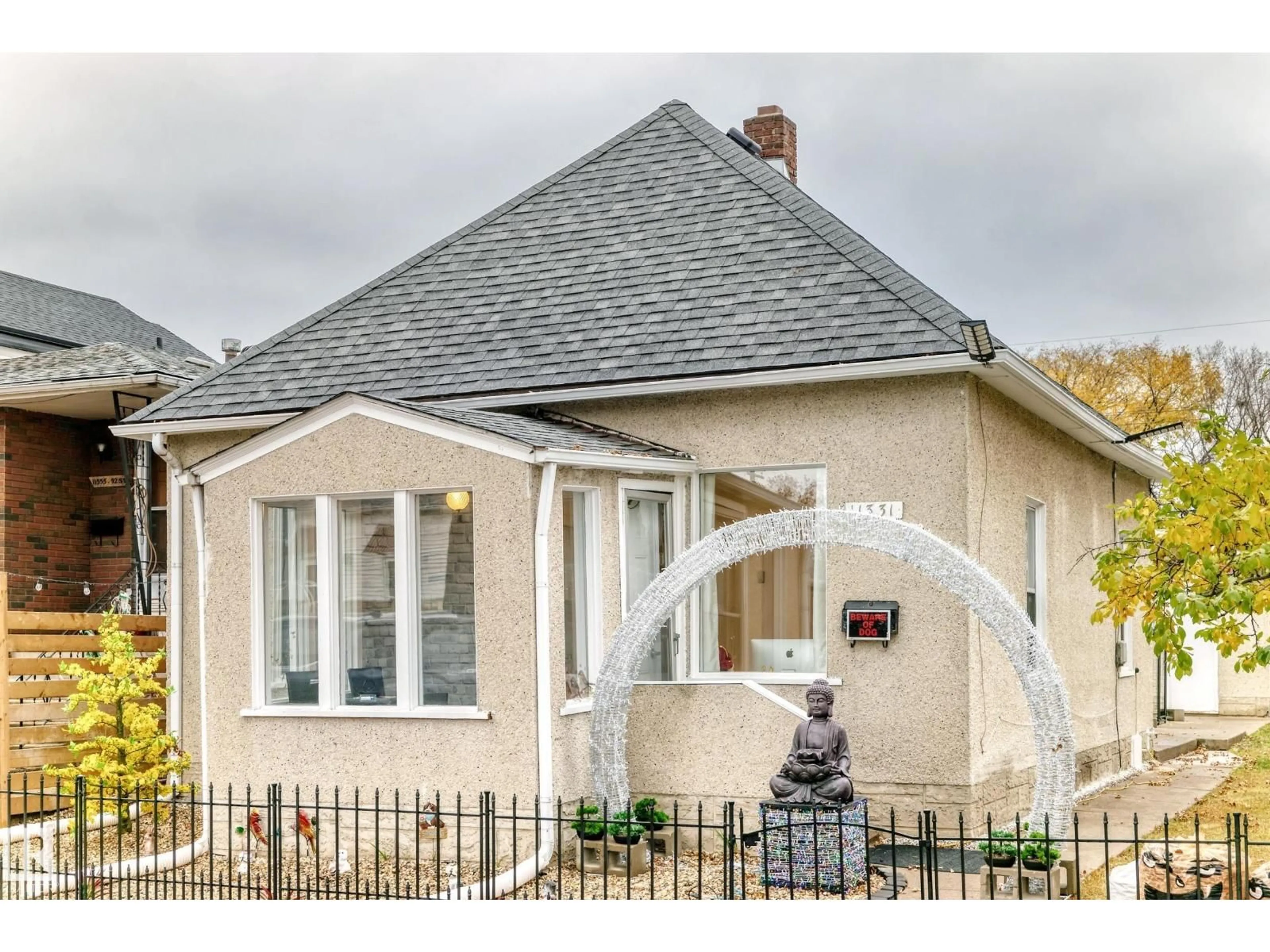 Home with vinyl exterior material, street for NW - 11331 92 ST, Edmonton Alberta T5G0Z4