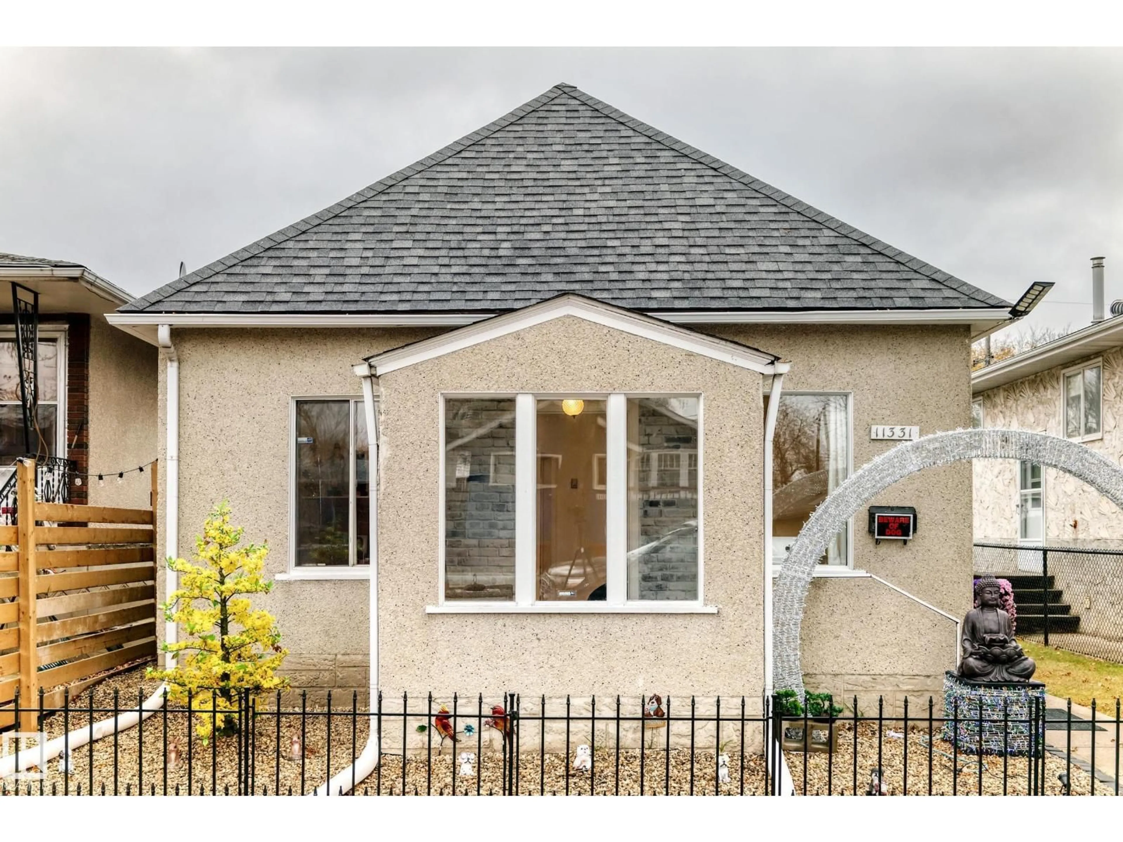 Home with brick exterior material, street for NW - 11331 92 ST, Edmonton Alberta T5G0Z4