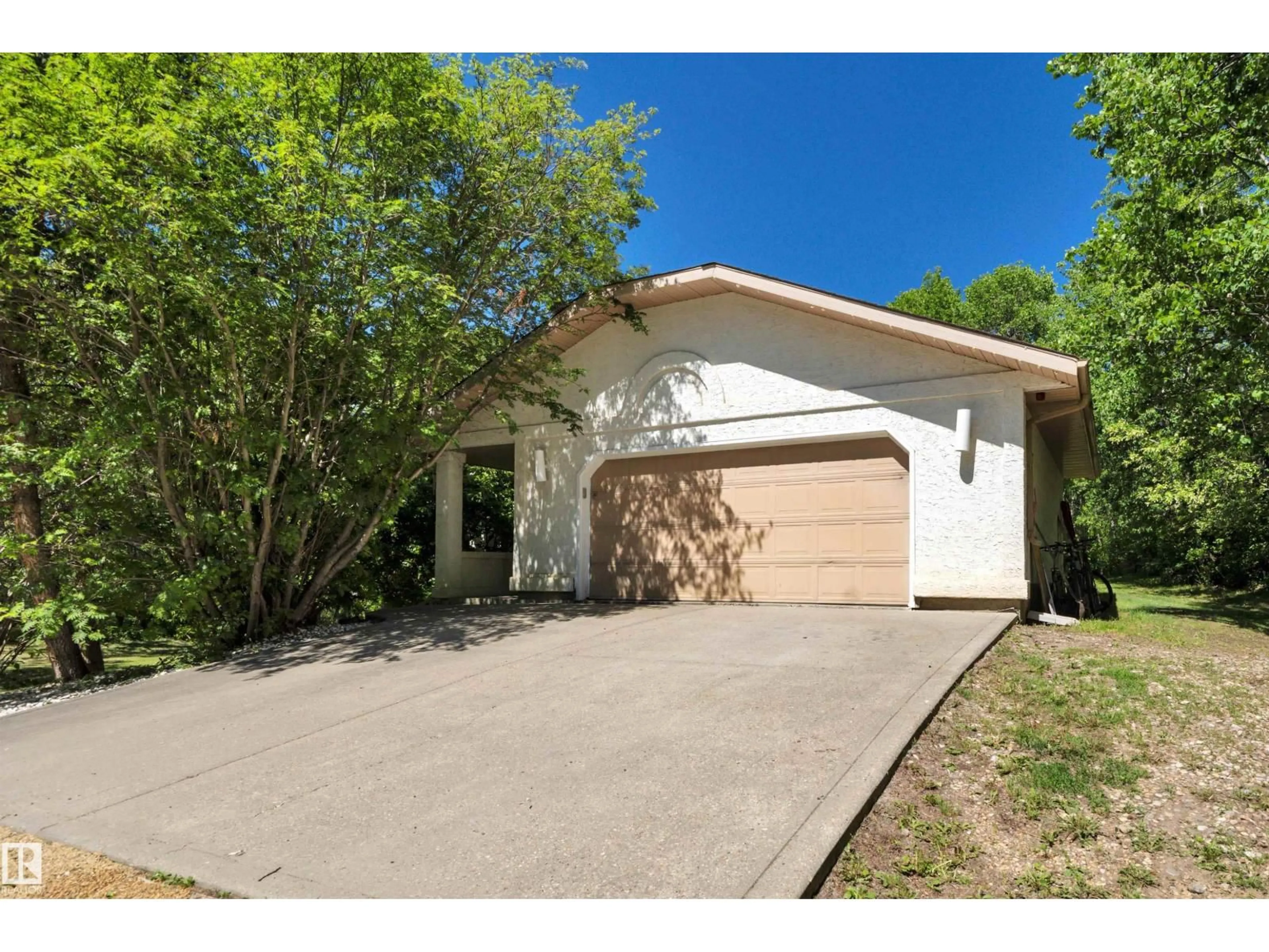 Home with vinyl exterior material, street for 40 50470 RGE ROAD 234, Rural Leduc County Alberta T4X0L7