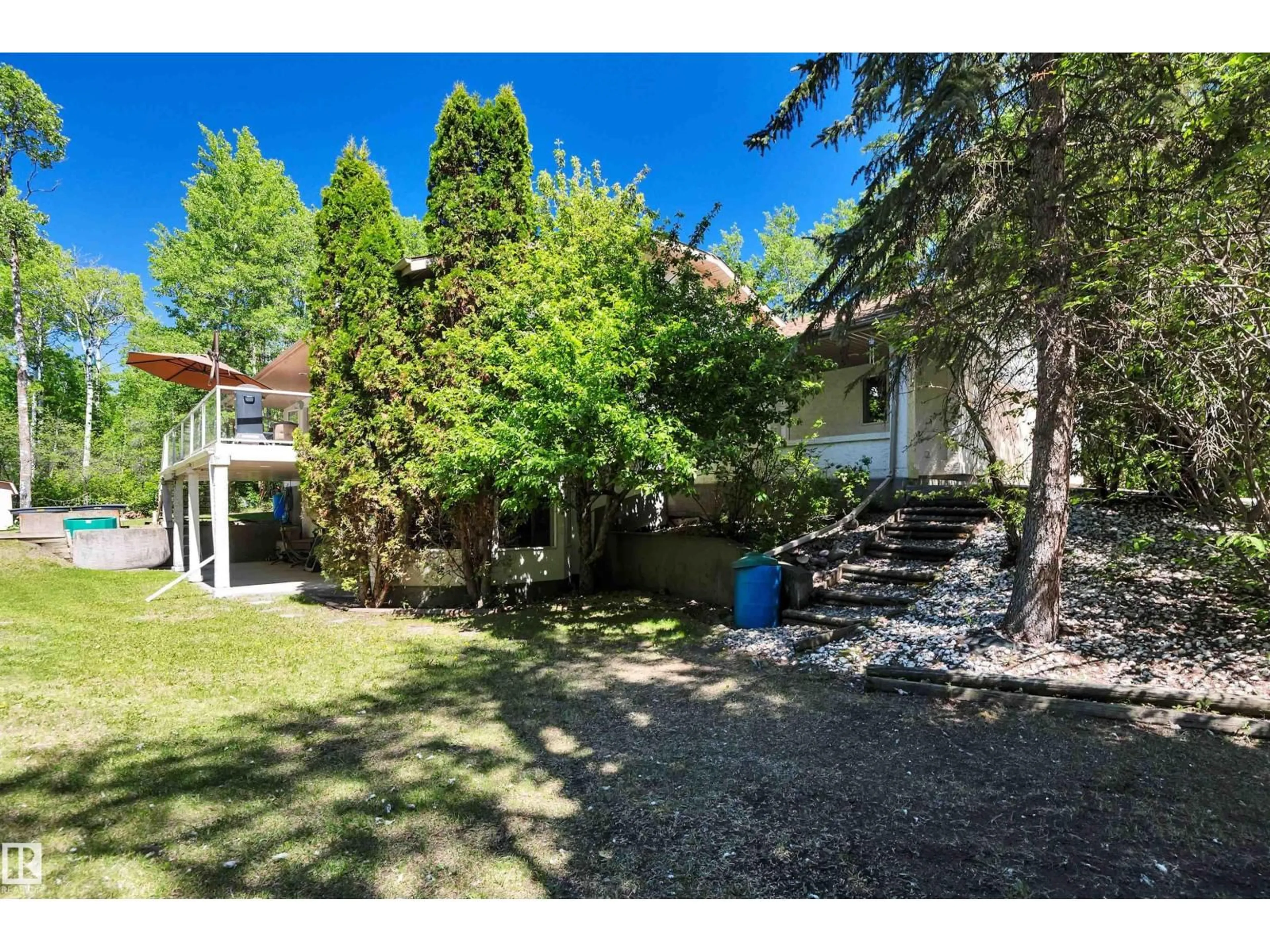 A pic from outside/outdoor area/front of a property/back of a property/a pic from drone, street for 40 50470 RGE ROAD 234, Rural Leduc County Alberta T4X0L7