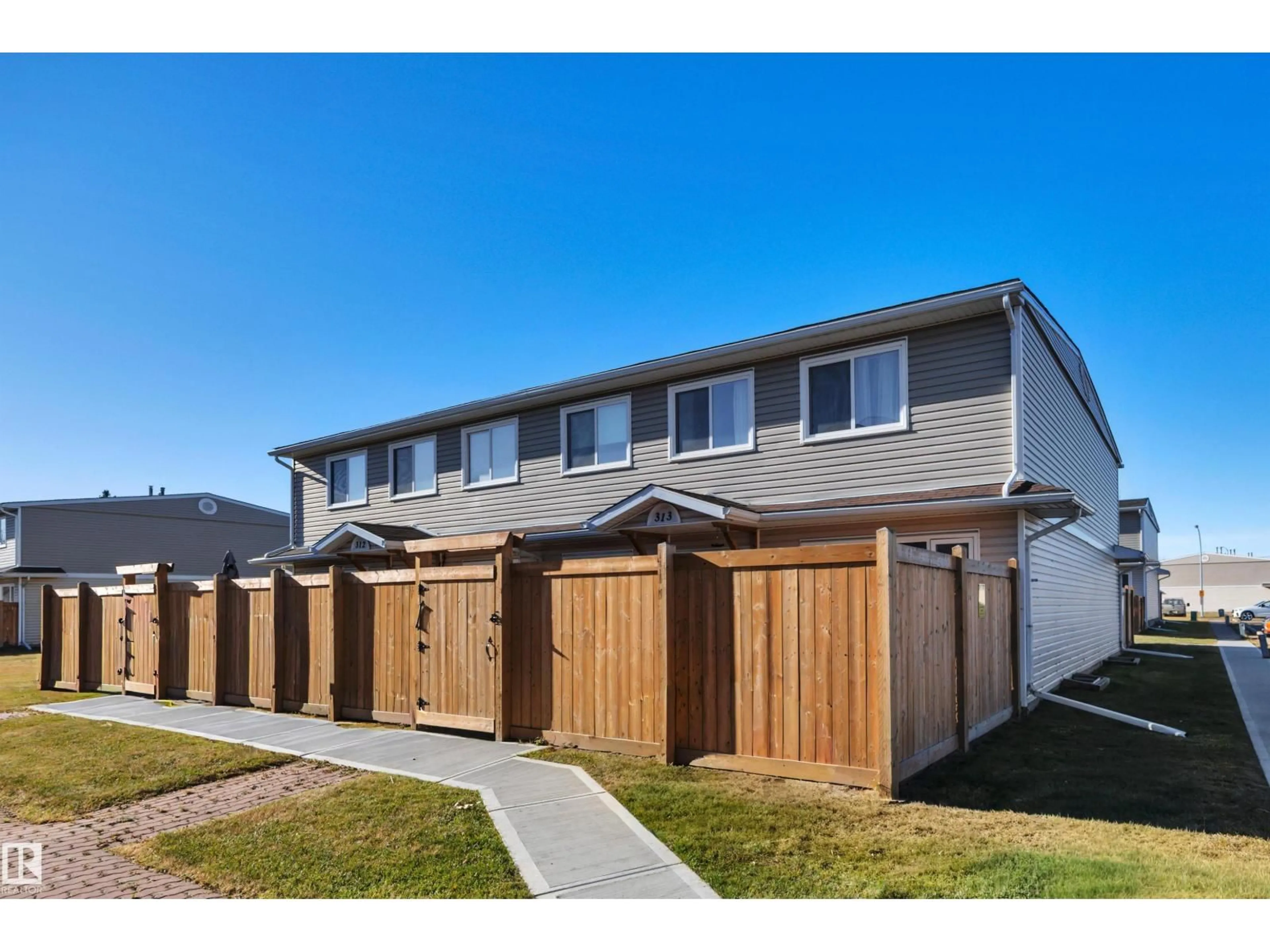 A pic from outside/outdoor area/front of a property/back of a property/a pic from drone, street for 313 TELFORD CO, Leduc Alberta T9E5M8