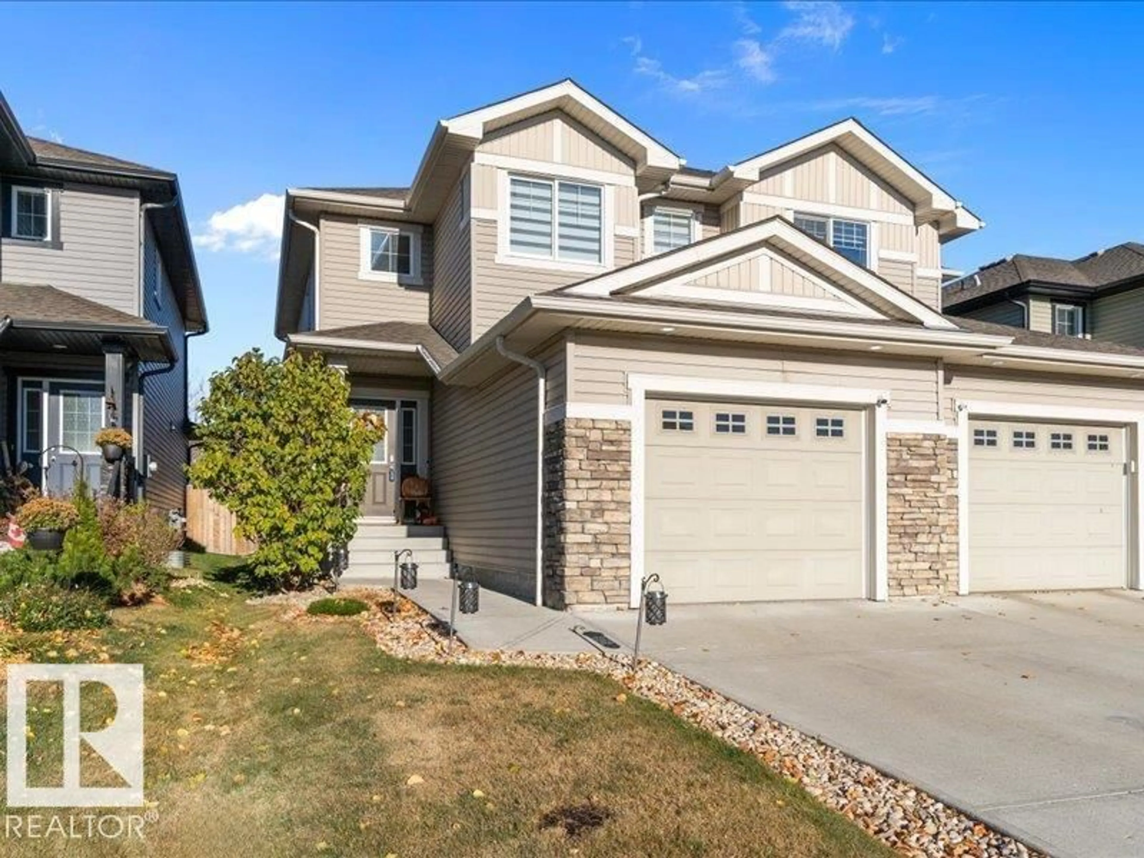 Home with vinyl exterior material, street for NW - 13434 166 AV, Edmonton Alberta T6V0G6