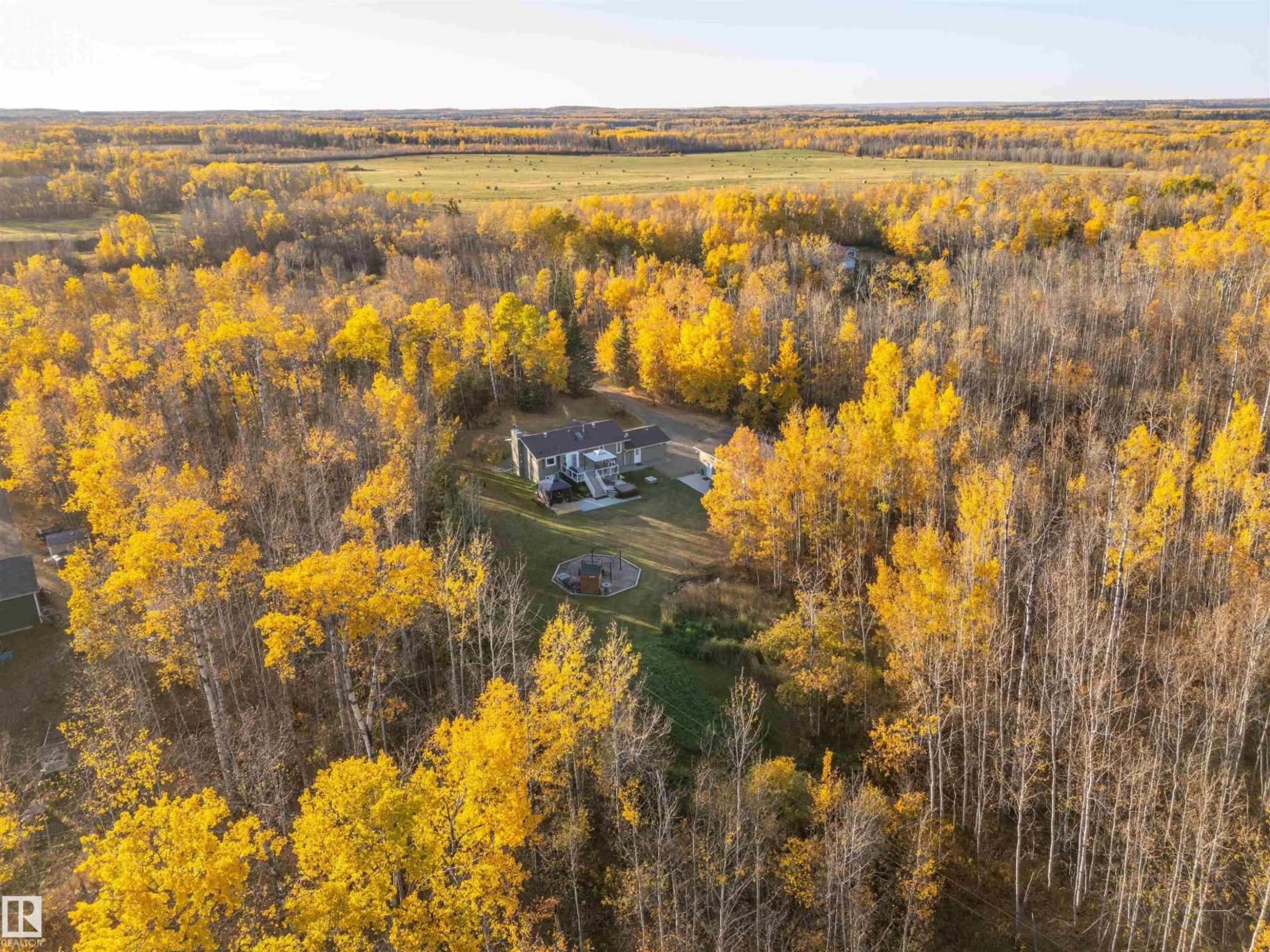 A pic from outside/outdoor area/front of a property/back of a property/a pic from drone, forest/trees view for 63005 RANGE ROAD 412, Rural Bonnyville M.D. Alberta T9M1P1