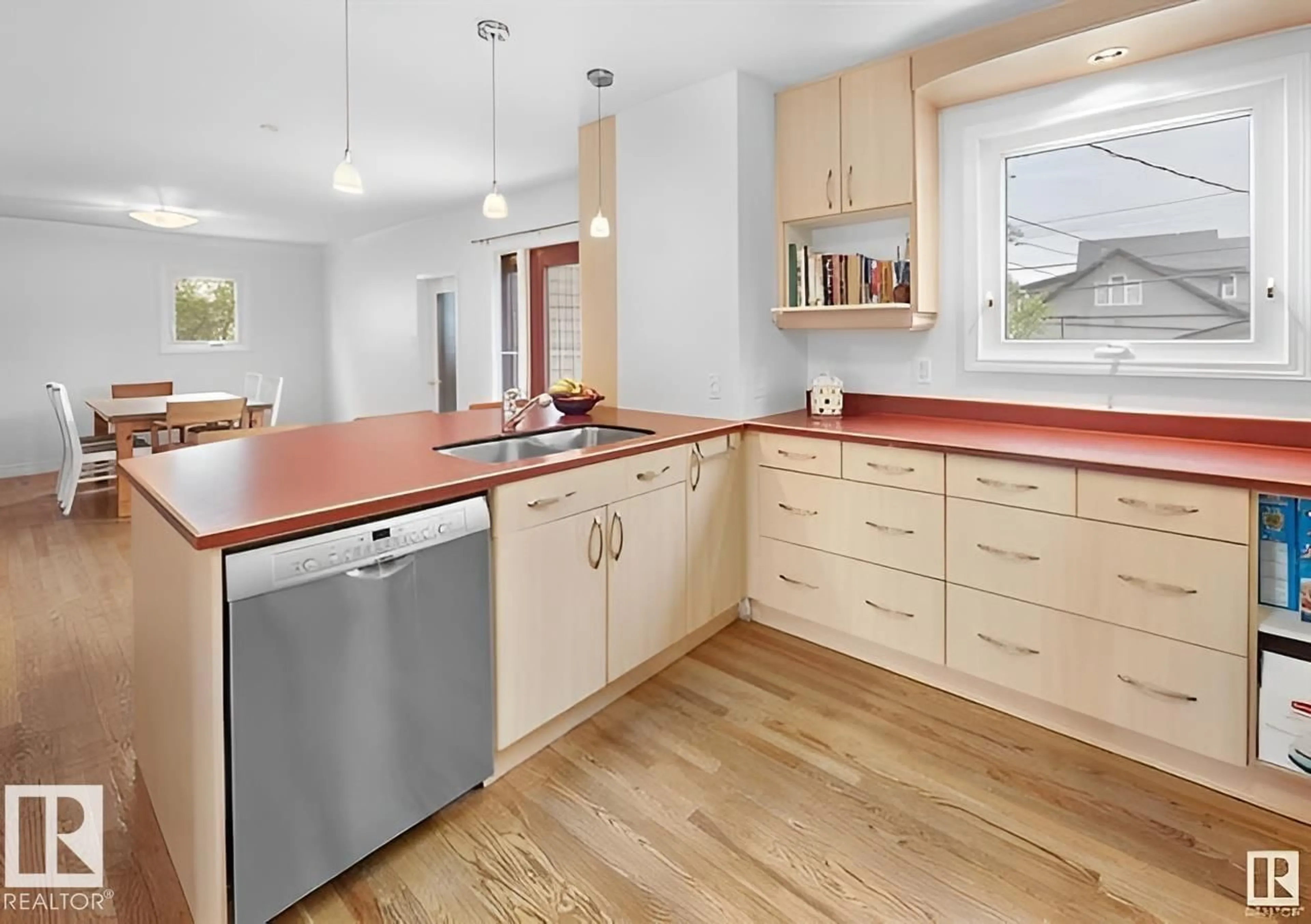 Open concept kitchen, wood/laminate floor for 11507 72 AV, Edmonton Alberta T6G0B7