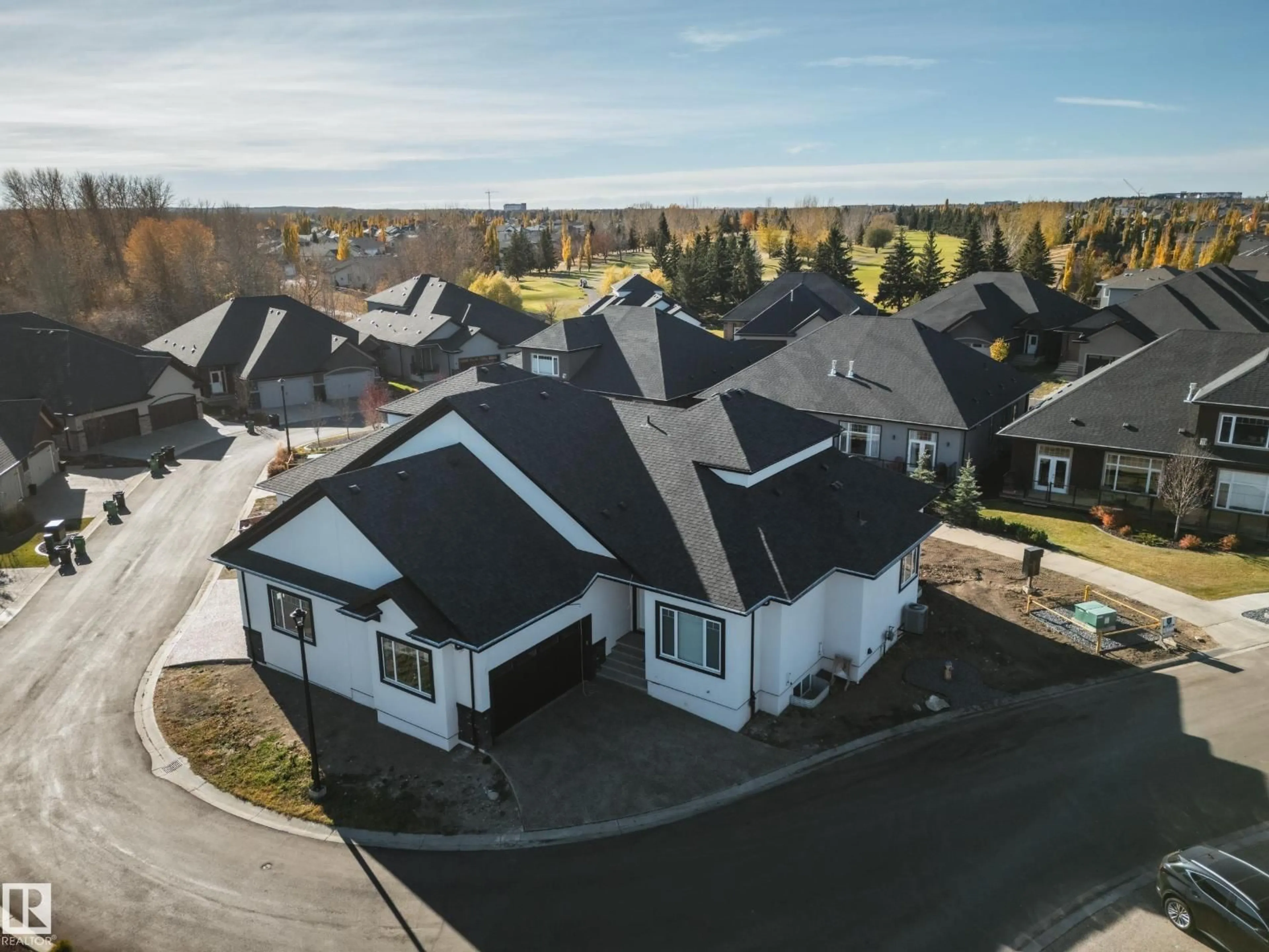 A pic from outside/outdoor area/front of a property/back of a property/a pic from drone, street for #42 - 20425 93 AV NW, Edmonton Alberta T5T7C7