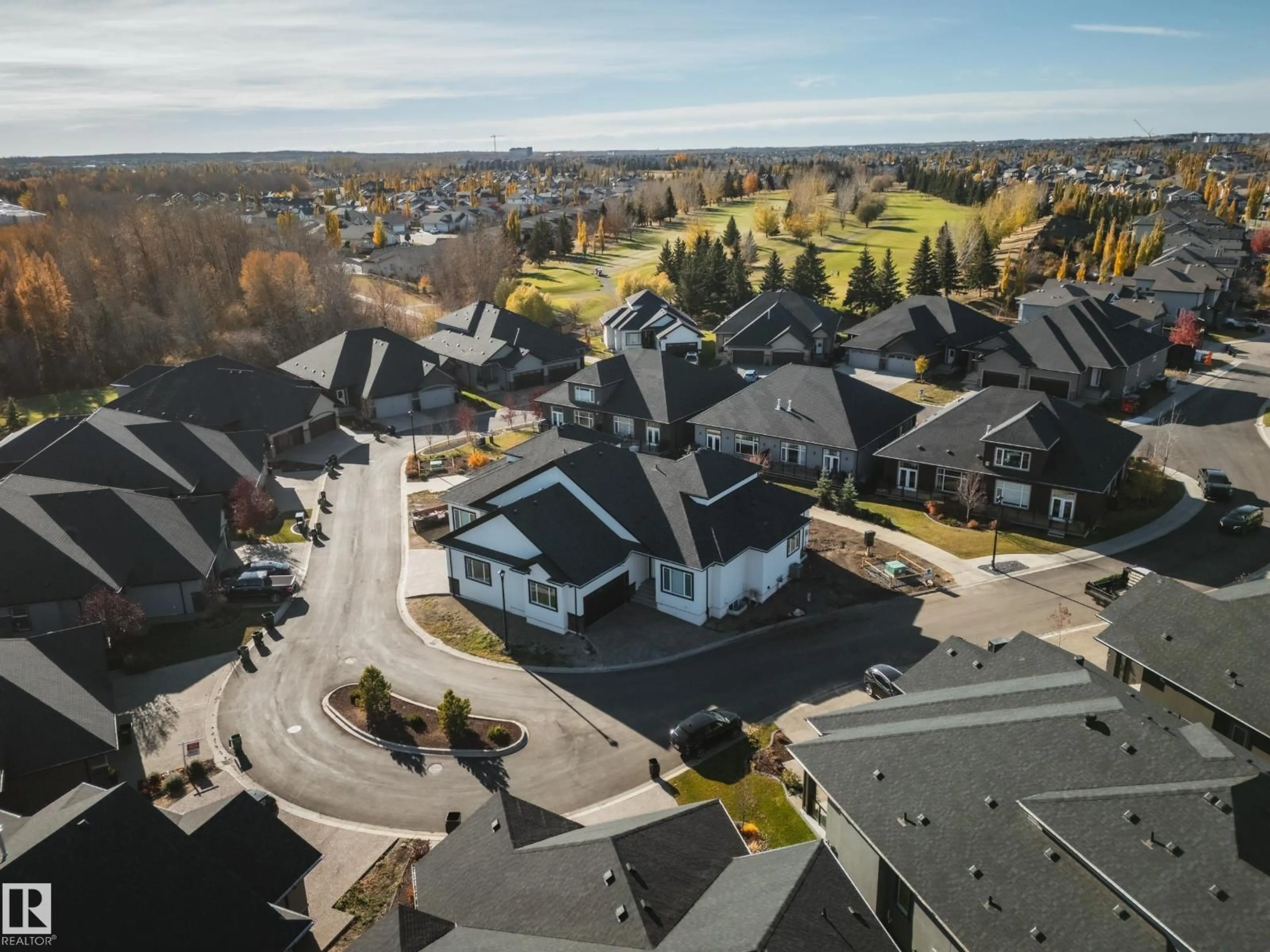 A pic from outside/outdoor area/front of a property/back of a property/a pic from drone, mountain view for #42 - 20425 93 AV NW, Edmonton Alberta T5T7C7
