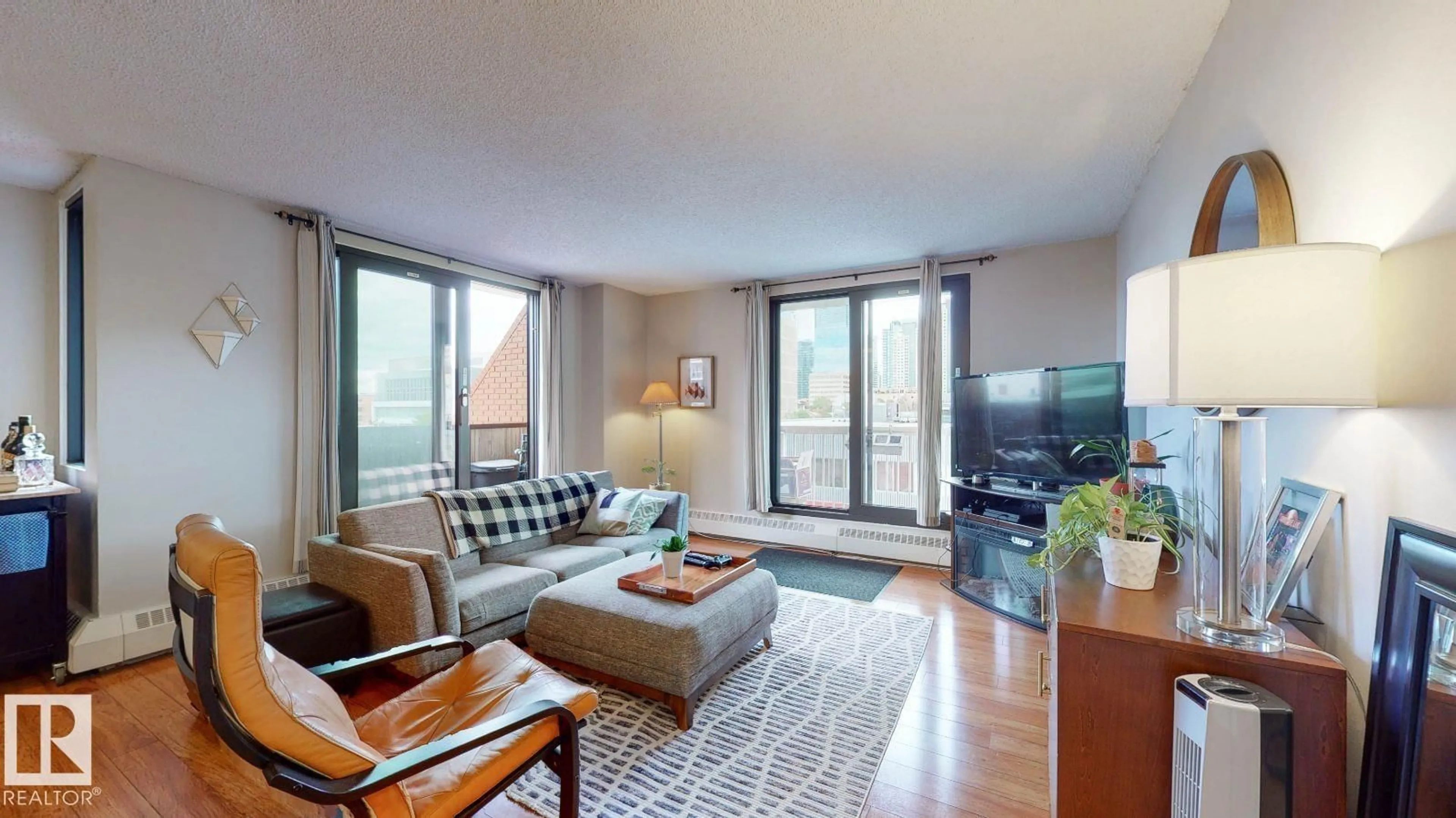 Living room with furniture, unknown for 301 - 10175 109 ST NW, Edmonton Alberta T5J3P2